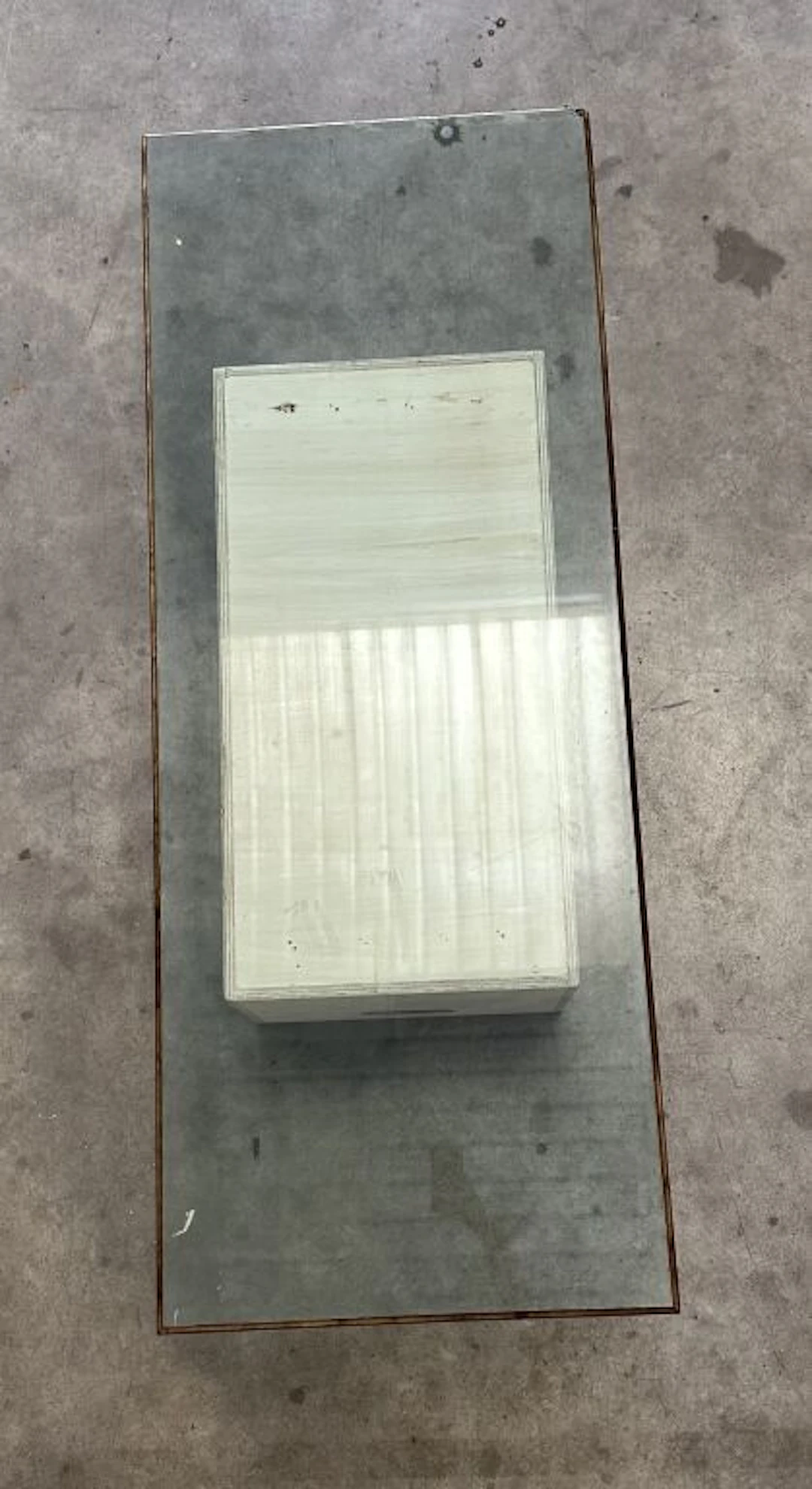Rectangular glass top with a beveled, gilded edge. 155 x 61 cm. (Damage