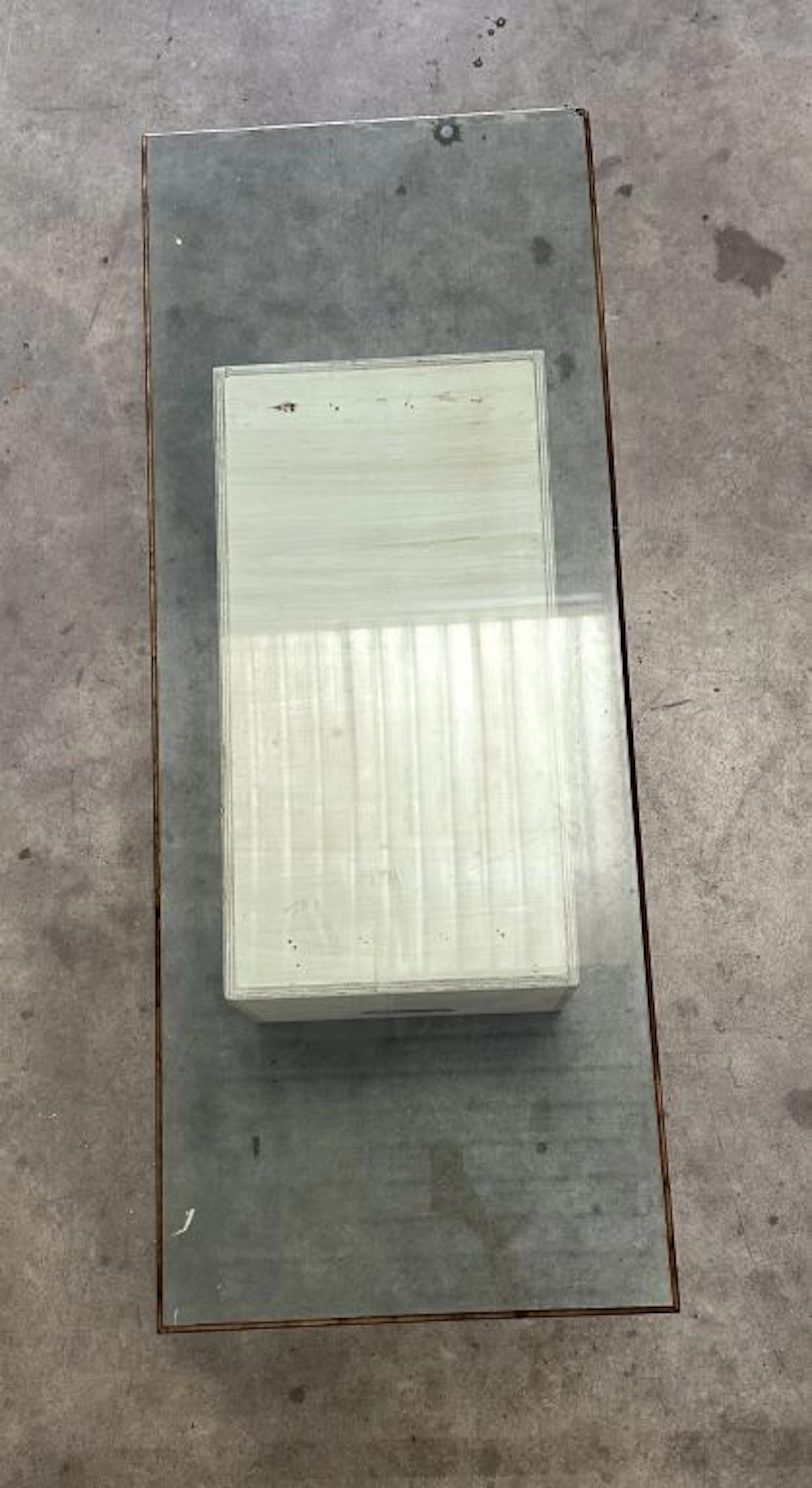 Rectangular glass top with a beveled, gilded edge. 155 x 61 cm. (Damage