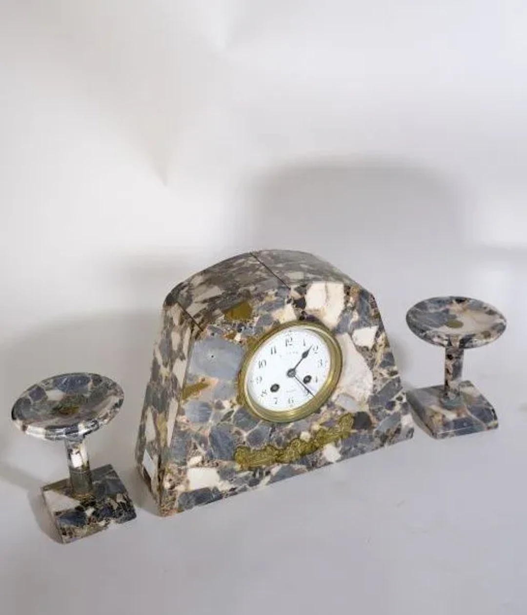 Recomposed marble mantelpiece set featuring a wall clock with an enameled