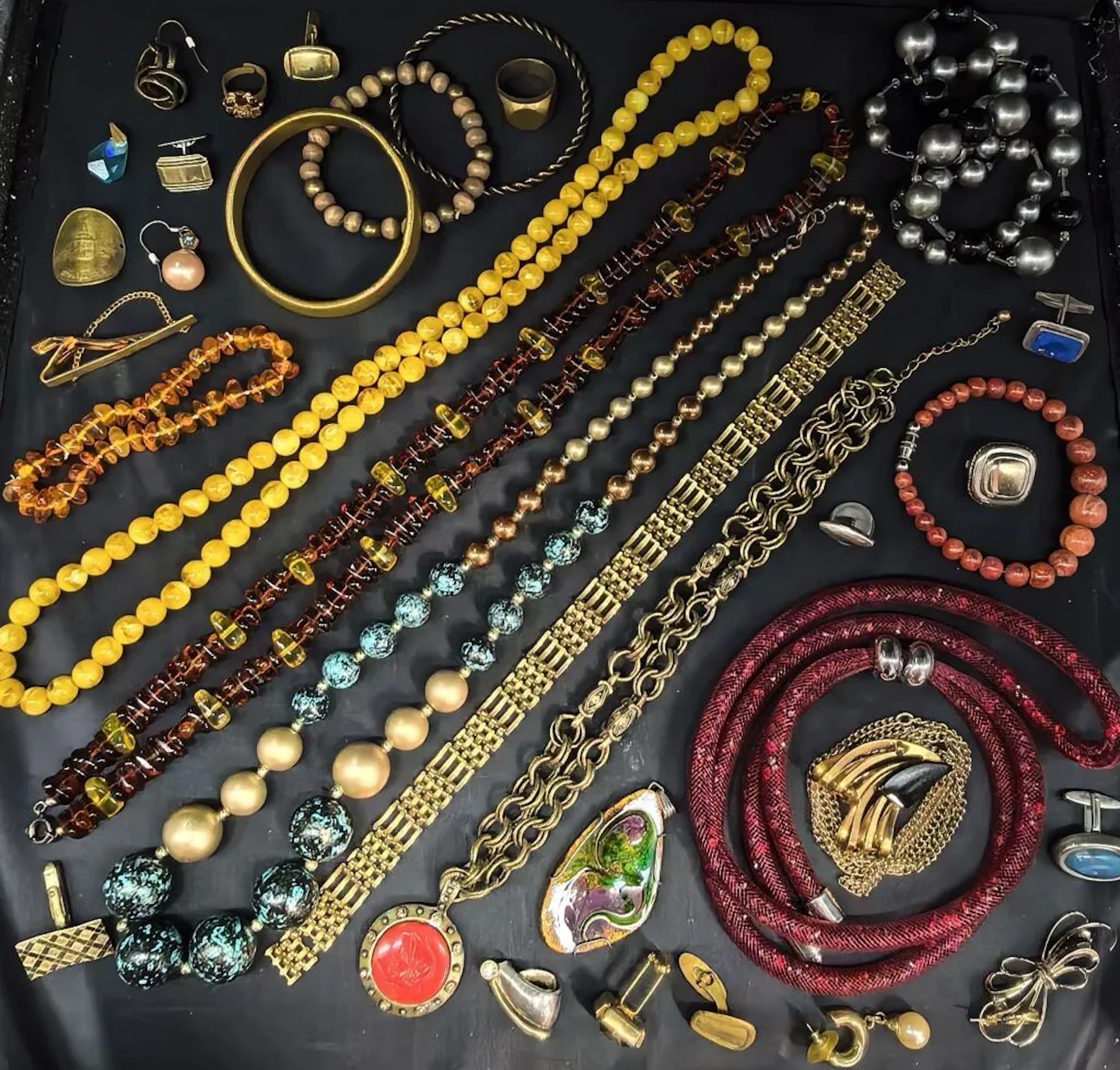A collection of costume jewelry, sometimes made from natural materials