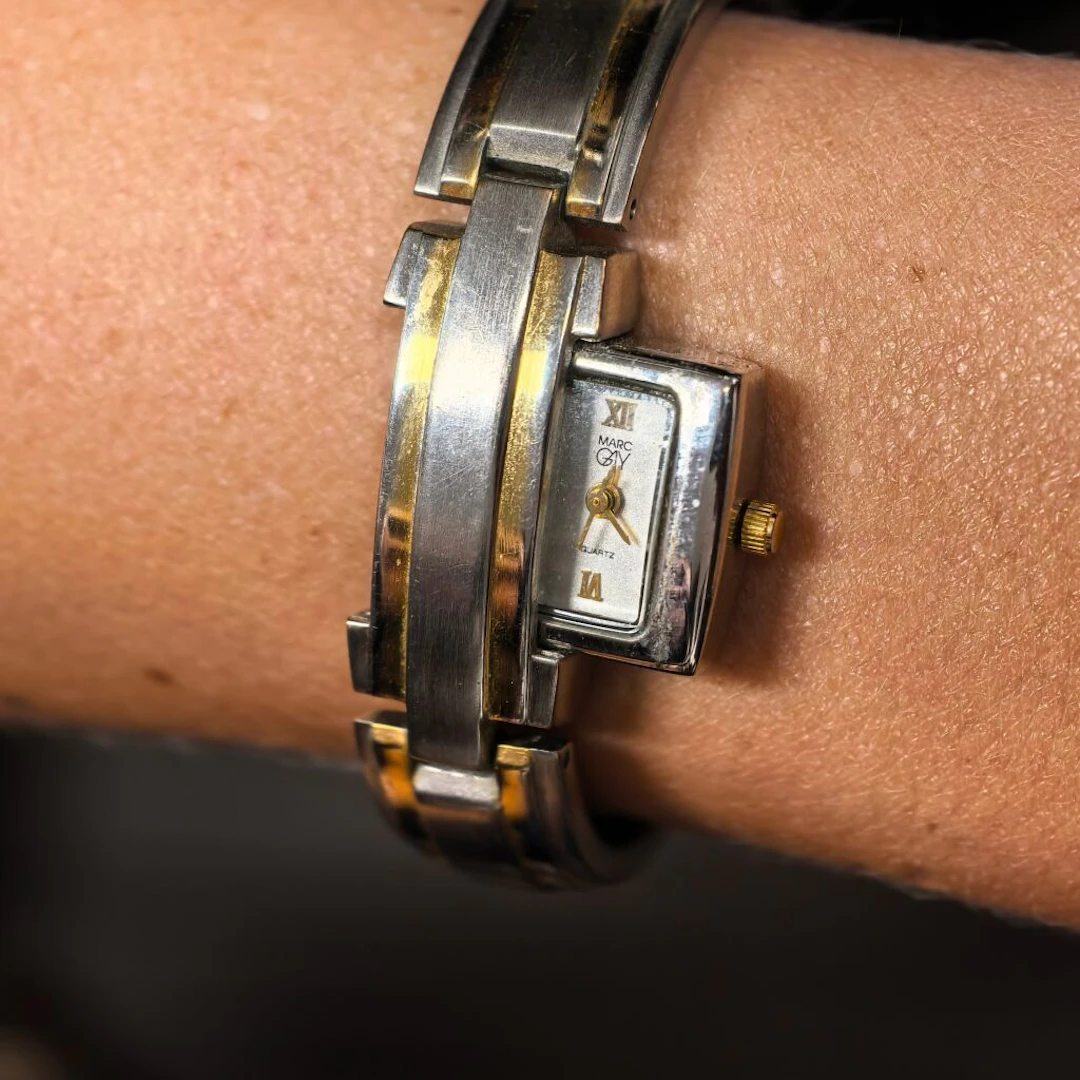 A set of steel and gold-plated watches, including two Lip watches—one