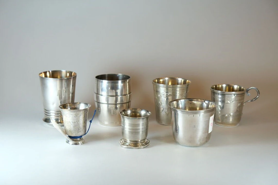 Set of seven 925/1000 silver goblets as shown below: - A small goblet