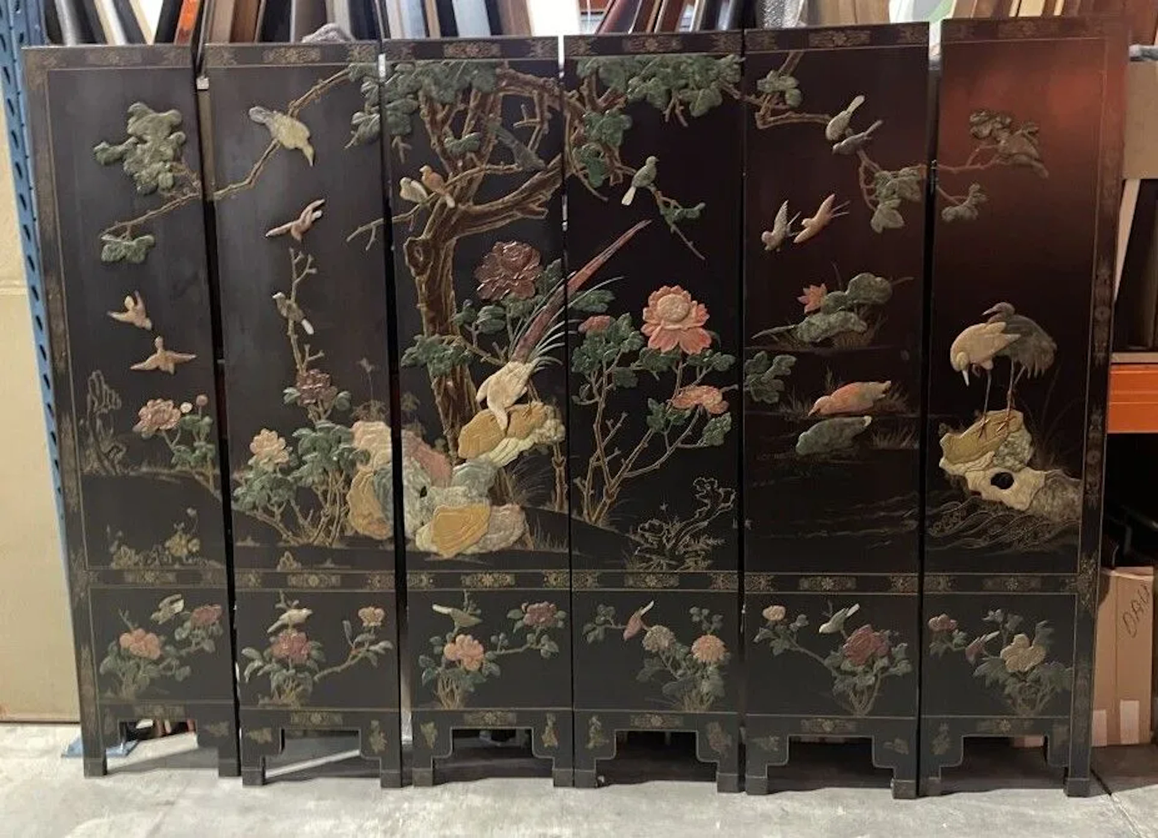 Lacquered folding screen with inlays of semi-precious stones and mother-of-pearl