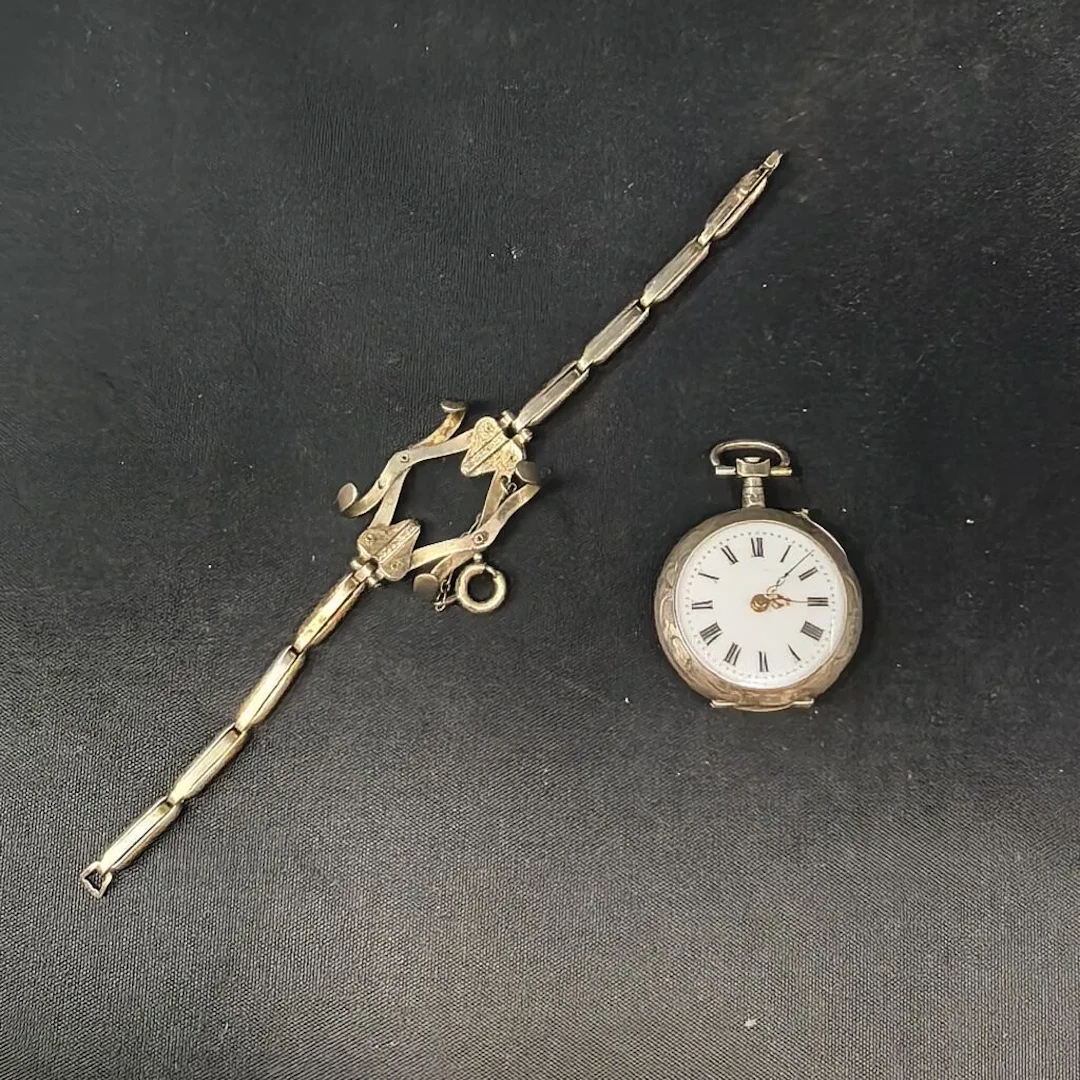 Pocket watch and adjustable strap, both made of 800‰ silver. Probably