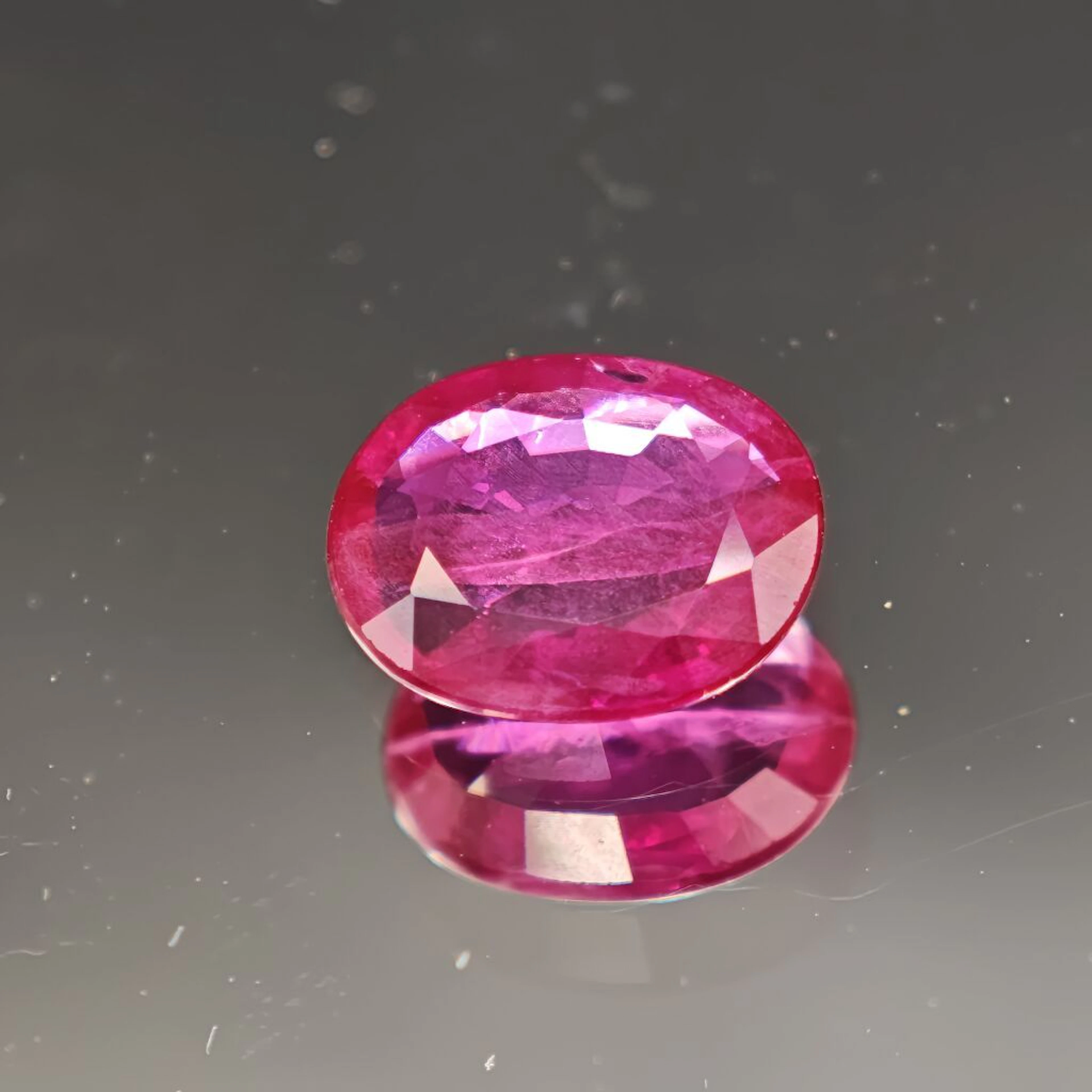 Oval-shaped heated ruby, weighing 1.60 ct, with an incredibly stunning