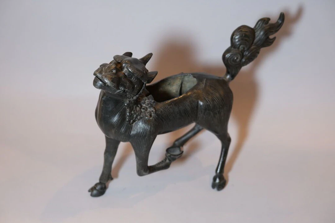 CHINA, 20th century. Large patinated bronze Qilin used as an incense