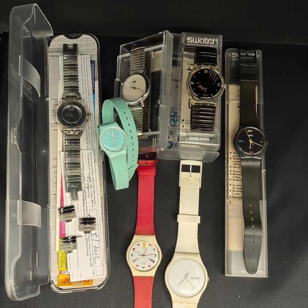 A lot of Swatch watches, as-is.