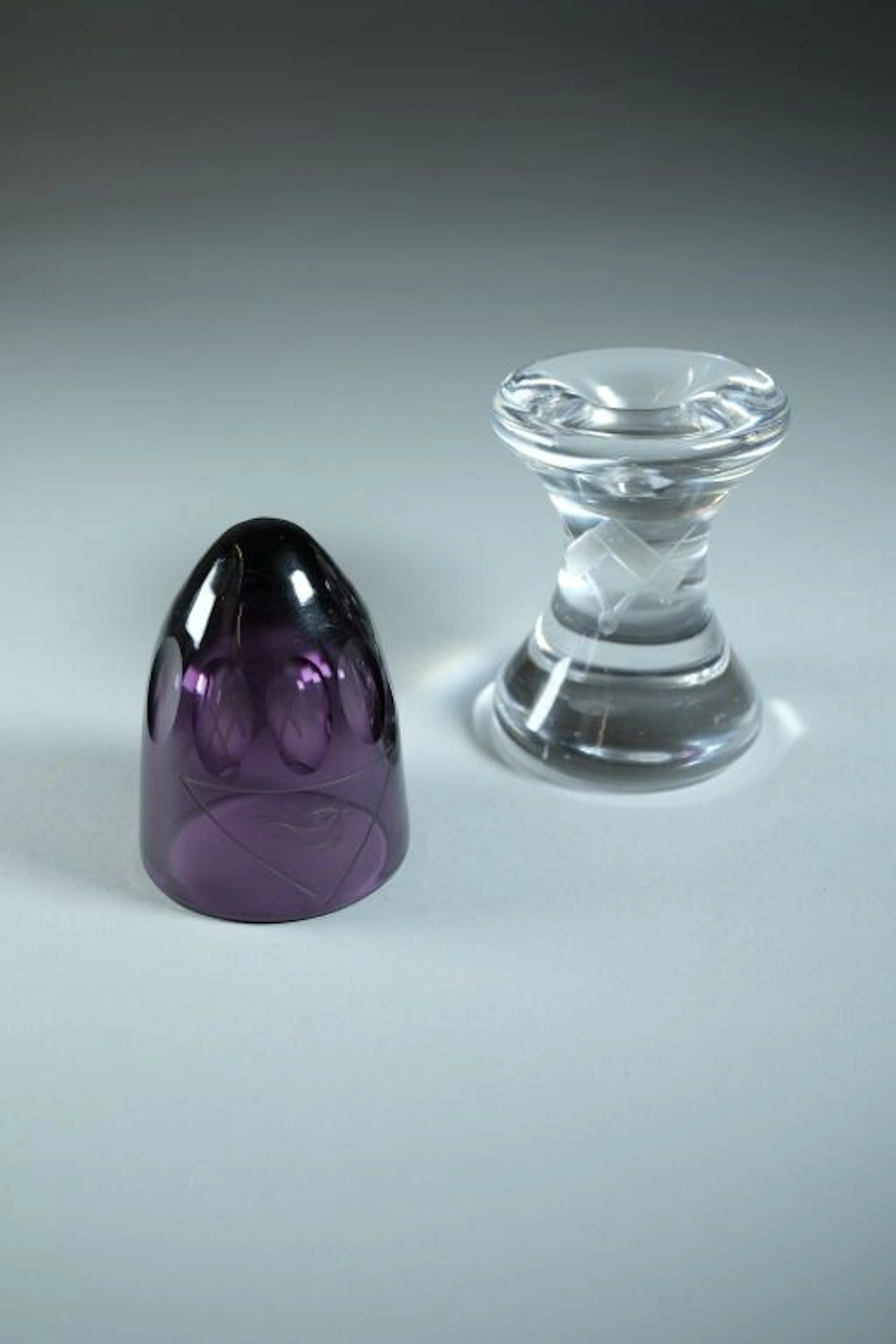Set of glassware including: - A crystal mallet engraved with a compass