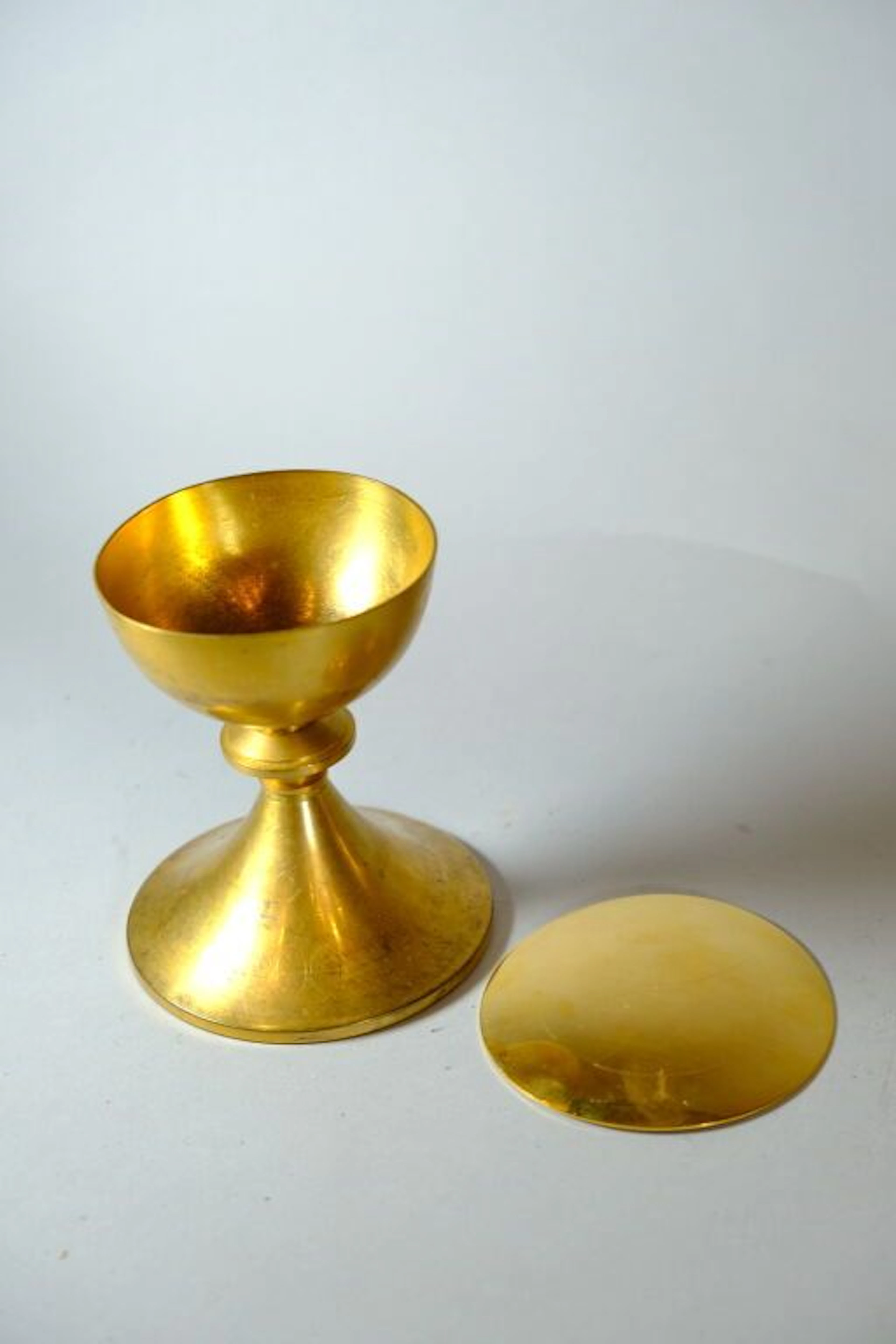 Ciborium and paten with an incised design of the Templar cross. Height