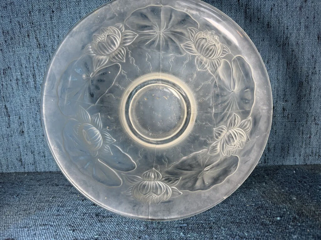 Pressed molded glass bowl decorated with water lilies and lotus flowers