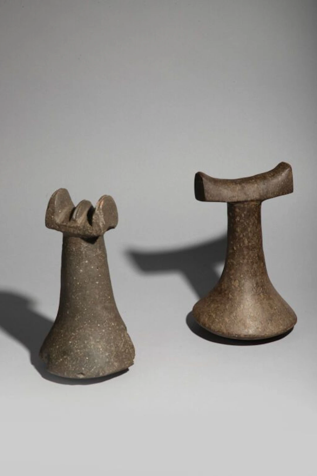 “Penu.” Winged pestle. Fine-grained black basalt. Society Islands