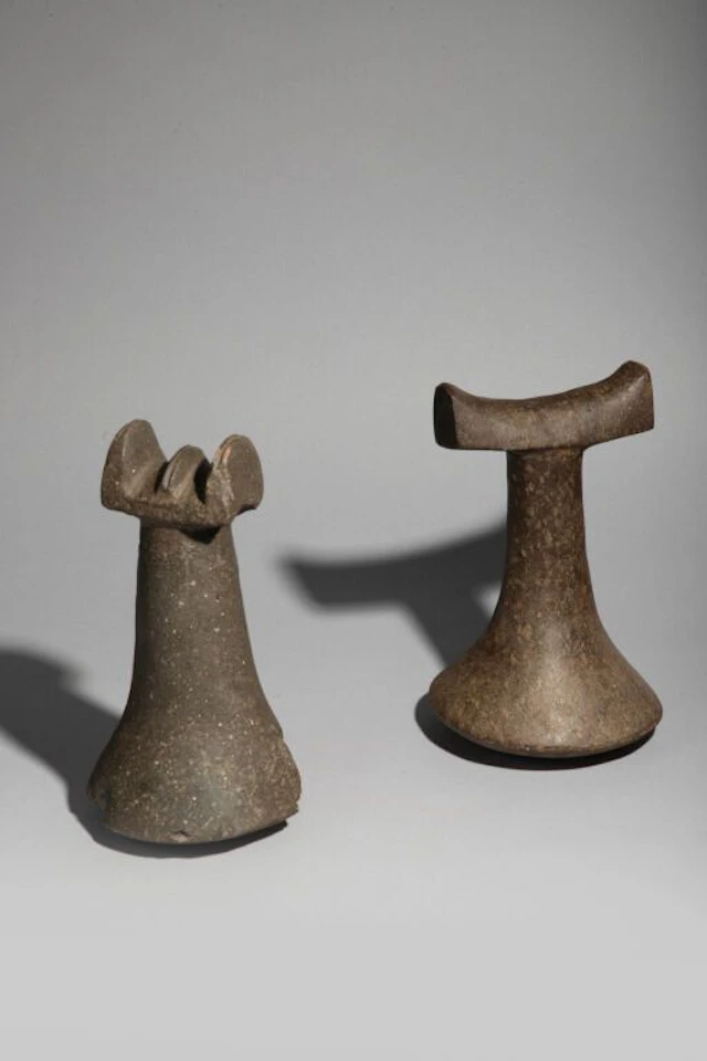 “Penu.” Winged pestle. Fine-grained black basalt. Society Islands