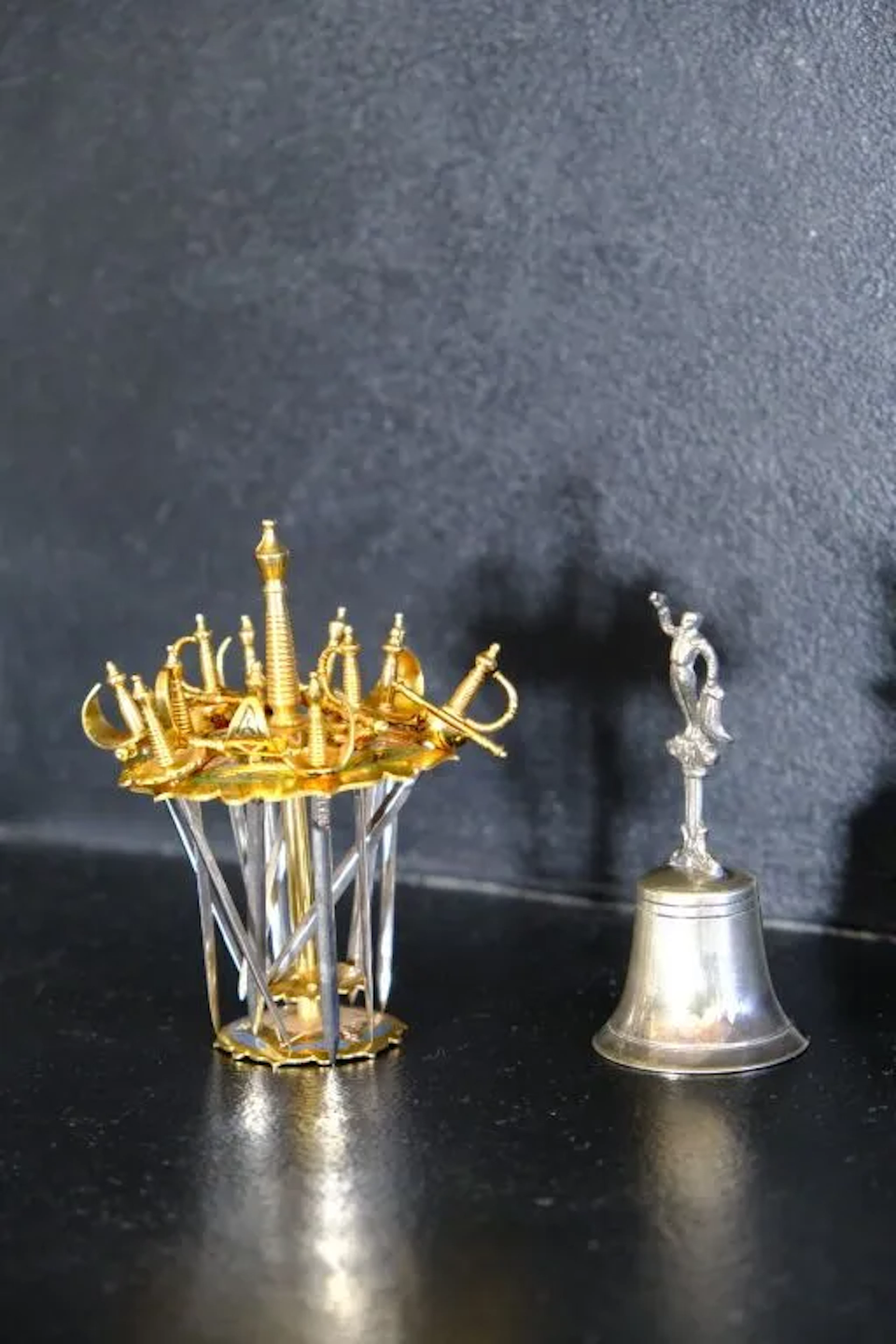 Small souvenirs from Toledo, including: - A bullfighter-themed table