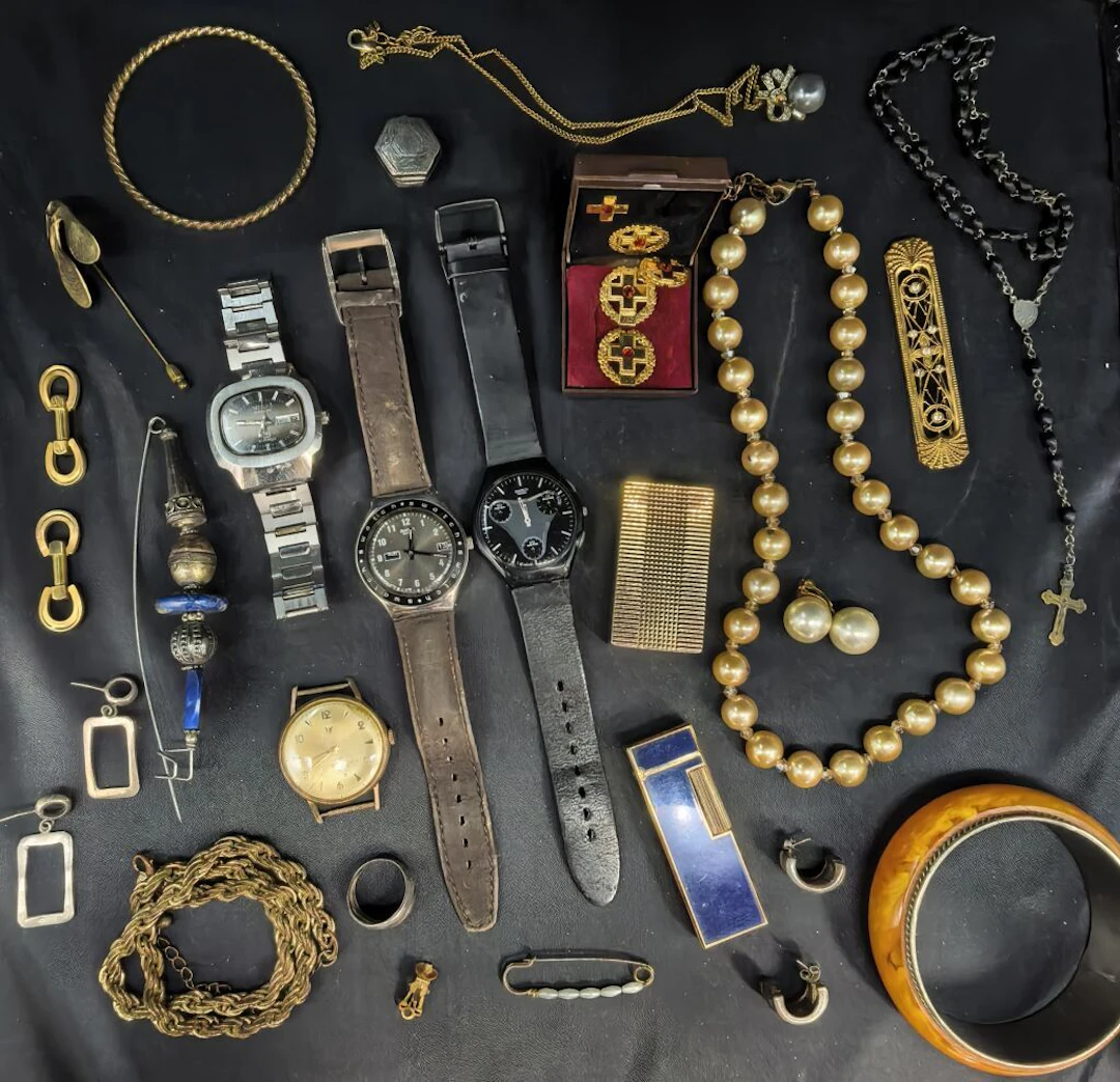 A collection of costume jewelry, bracelets, necklaces, gold-plated