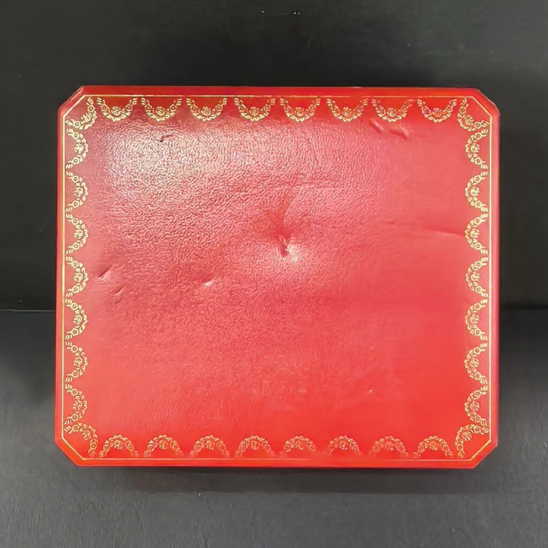 CARTIER. Ref. CO 1018. 1980s–1990s. Red watch case with gold-tone