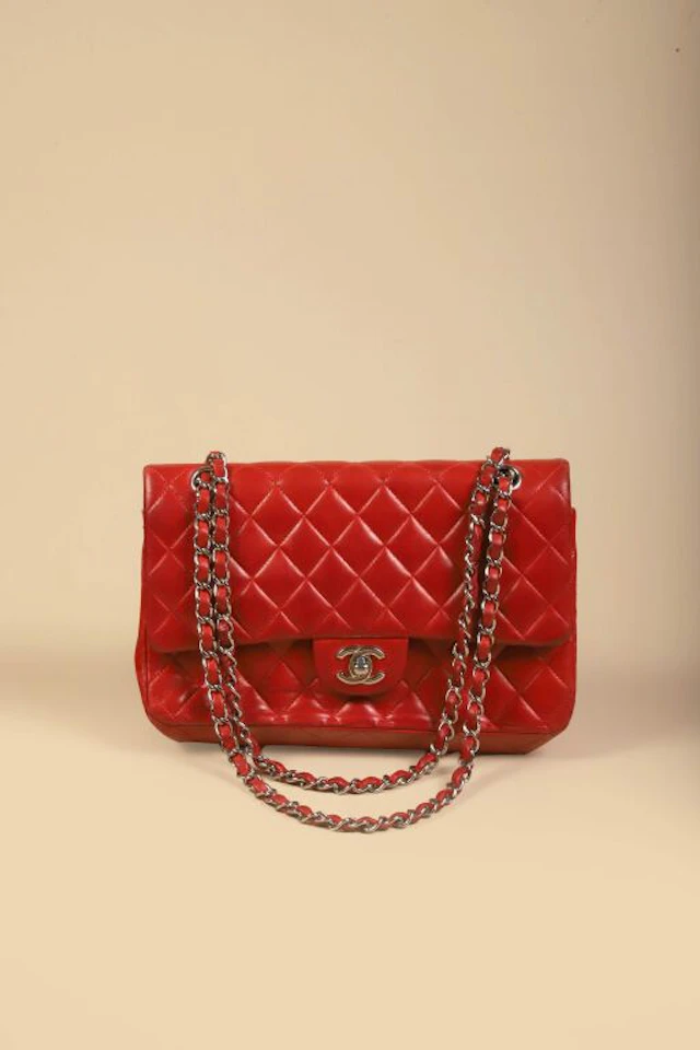 CHANEL (Made in France). Timeless bag in bright red quilted lambskin