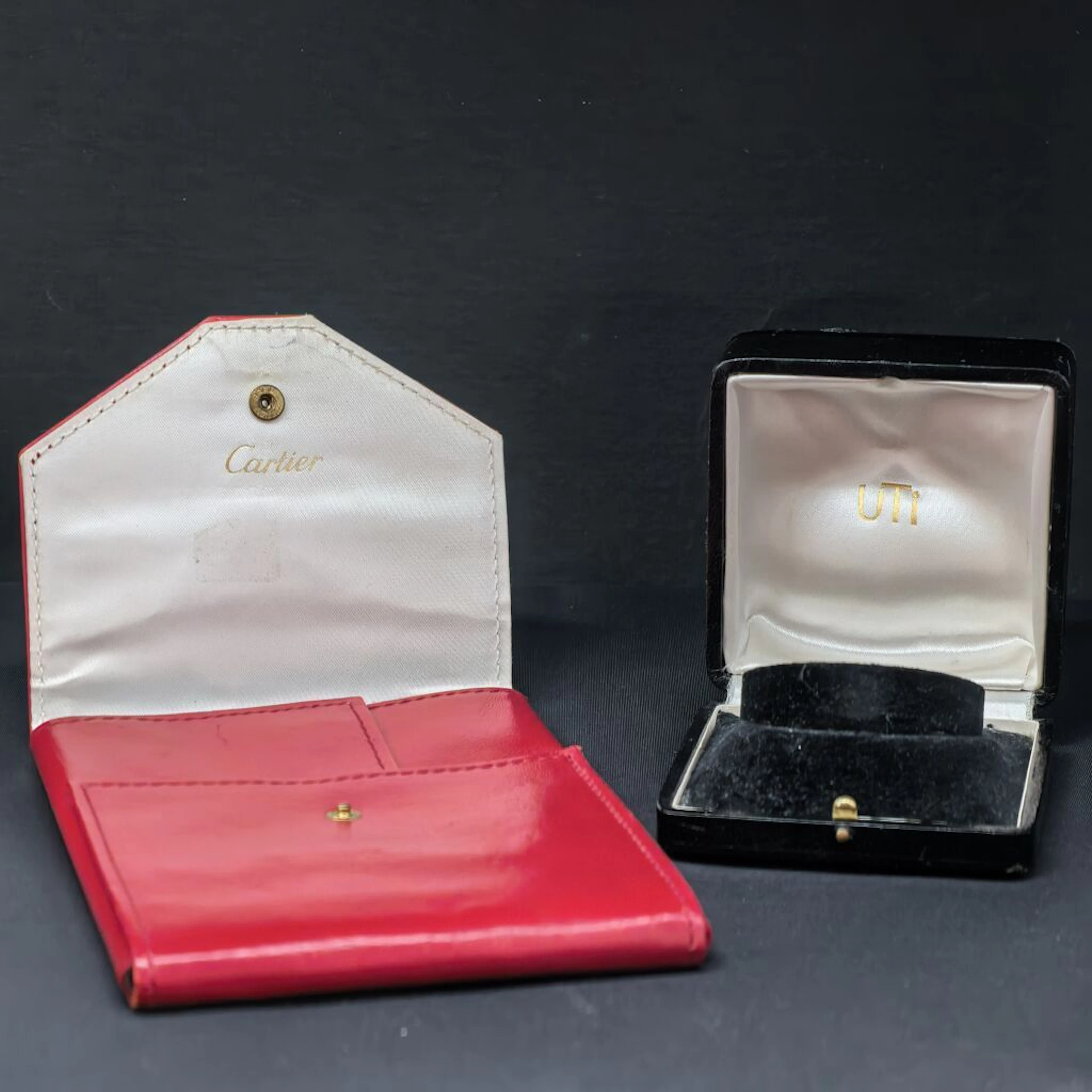 Set of jewelry boxes: - CARTIER: storage or travel pouch for a necklace