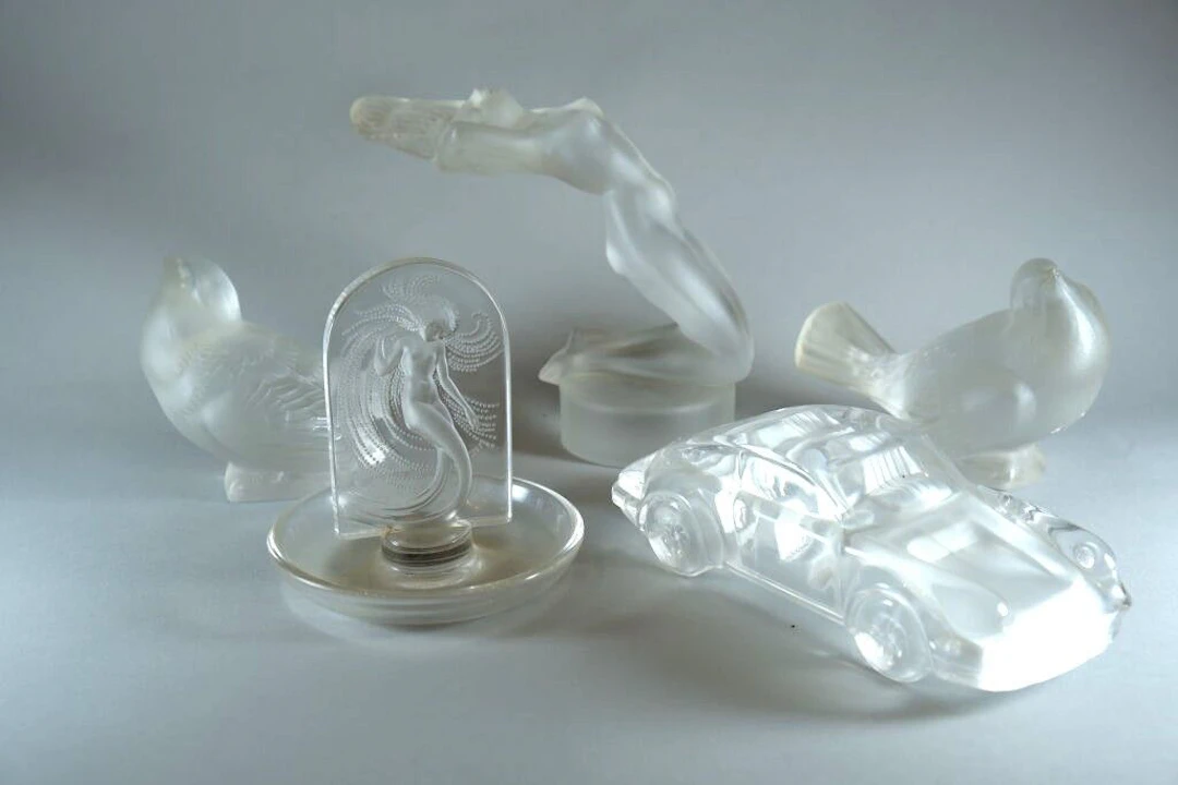 LALIQUE France. Set of 4 crystal pieces comprising: *LALIQUE: - Naiad