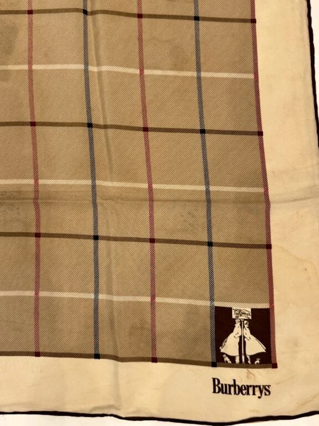 BURBERRY'S Silk scarf featuring the brand's signature Scottish tartan