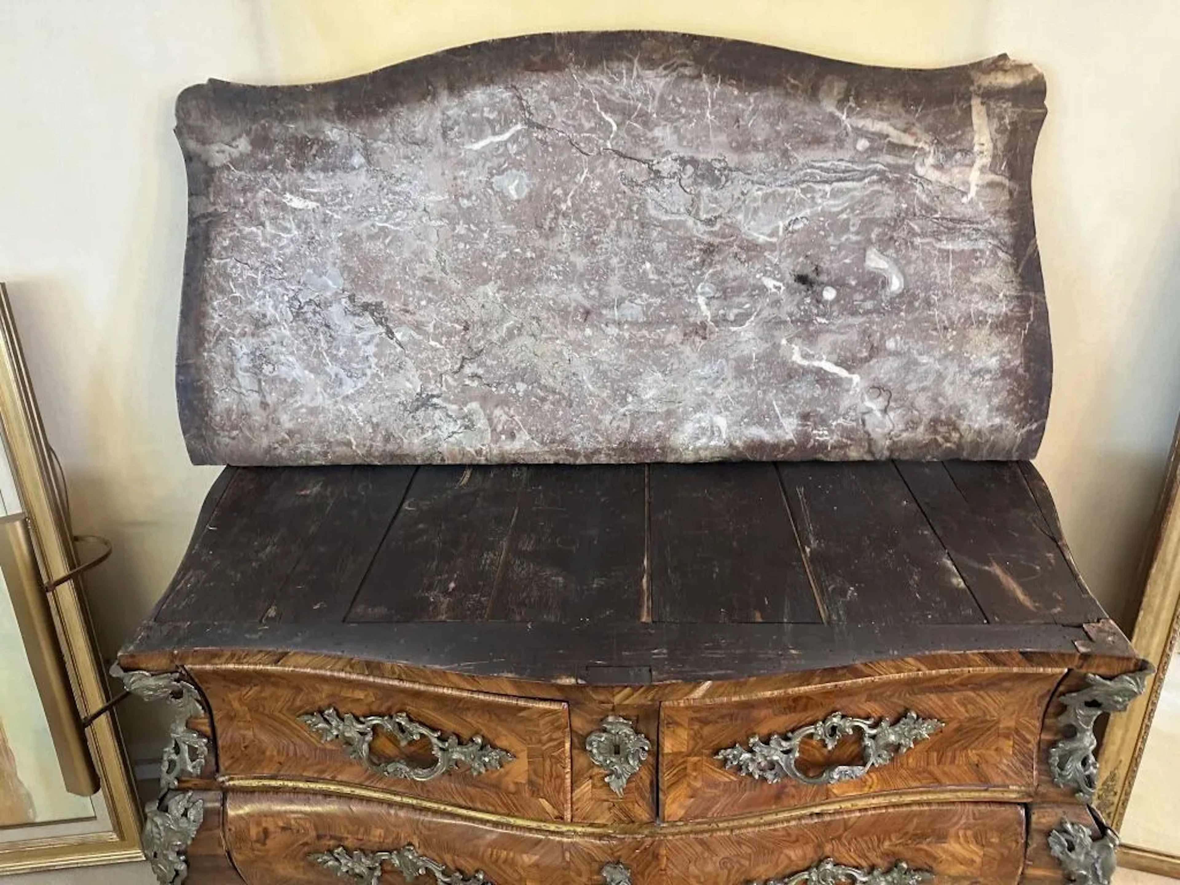 A curved chest of drawers with a tomb-like shape on all sides, made