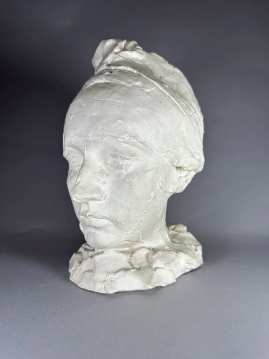 Based on a work by Auguste RODIN. Camille Claudel Wearing a Bonnet.