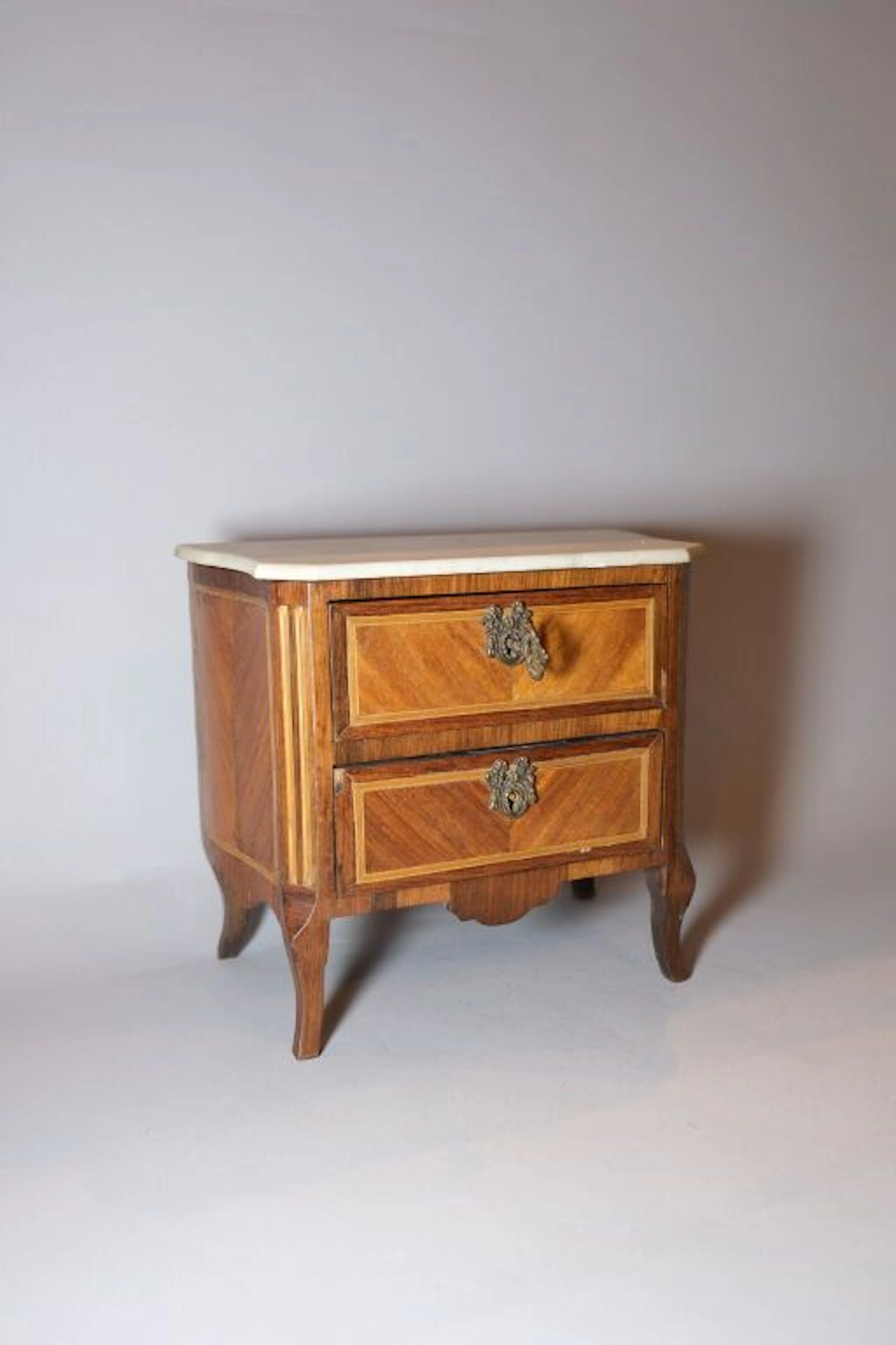 Small master’s chest made of solid wood and veneer, with two drawers