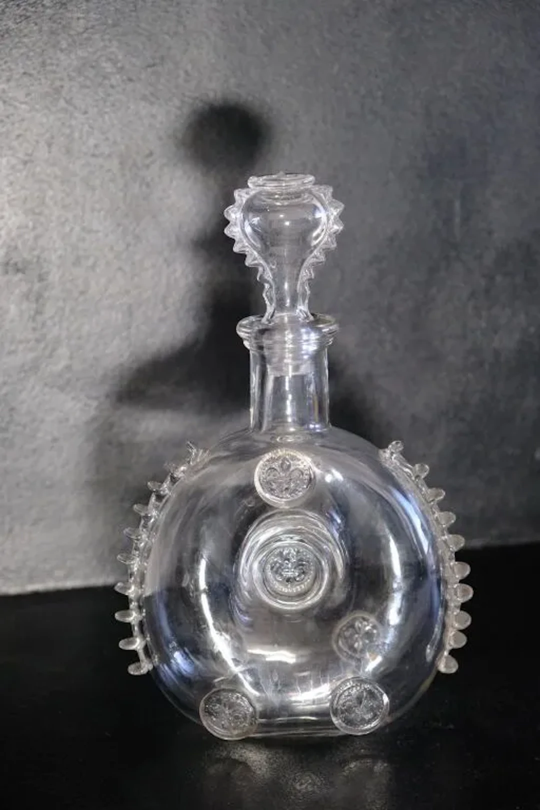 Remy Martin Louis XIII cognac bottle (empty). The cork is marked with