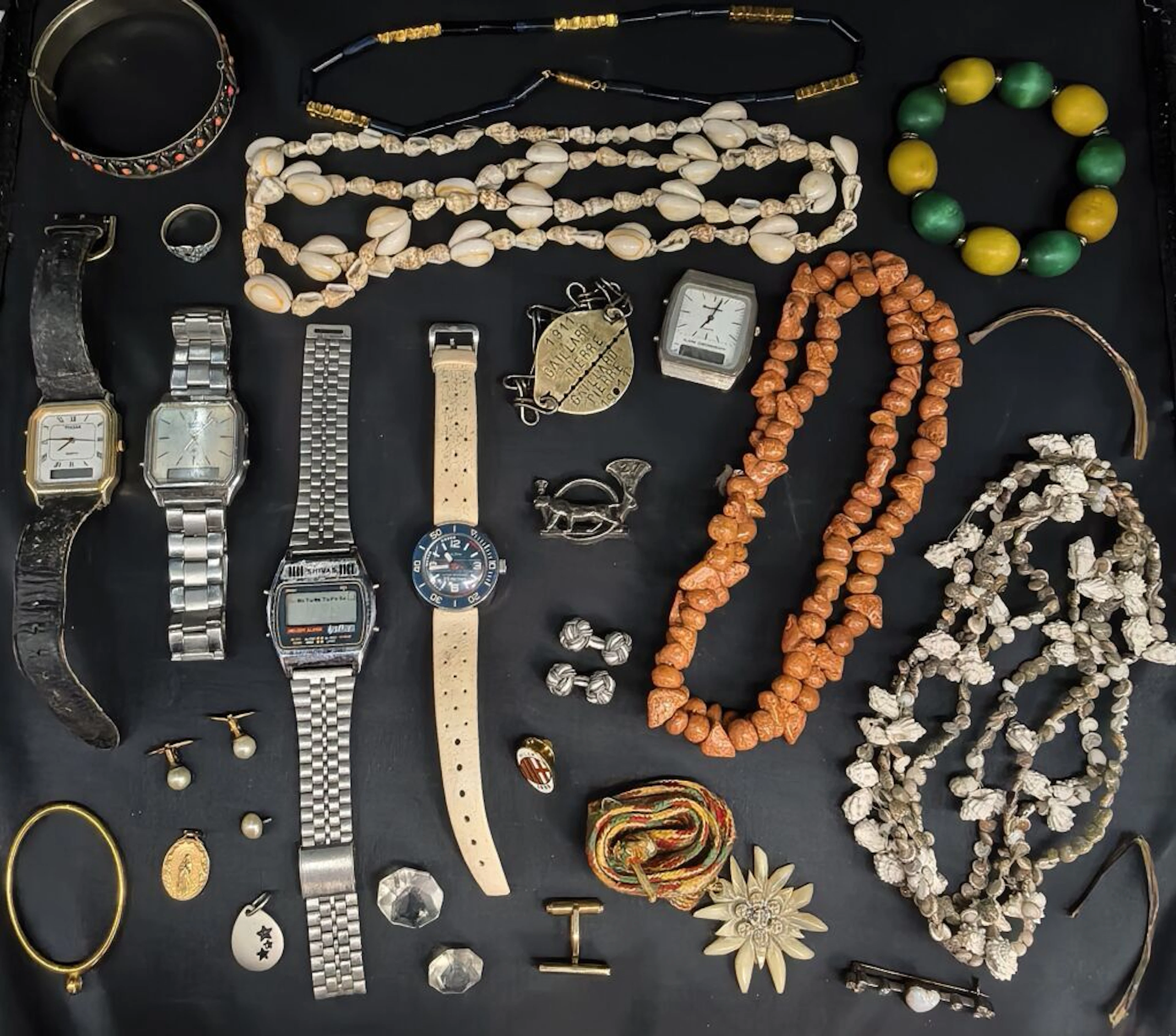 Assortment of costume jewelry, necklaces, bracelets (both rigid and