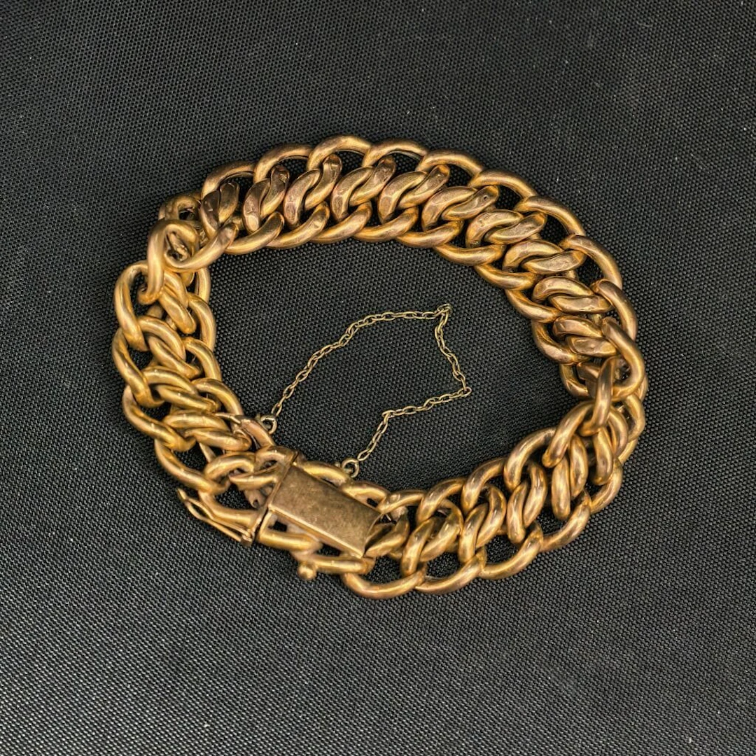 750‰ yellow gold bracelet with an American-style link design, NET