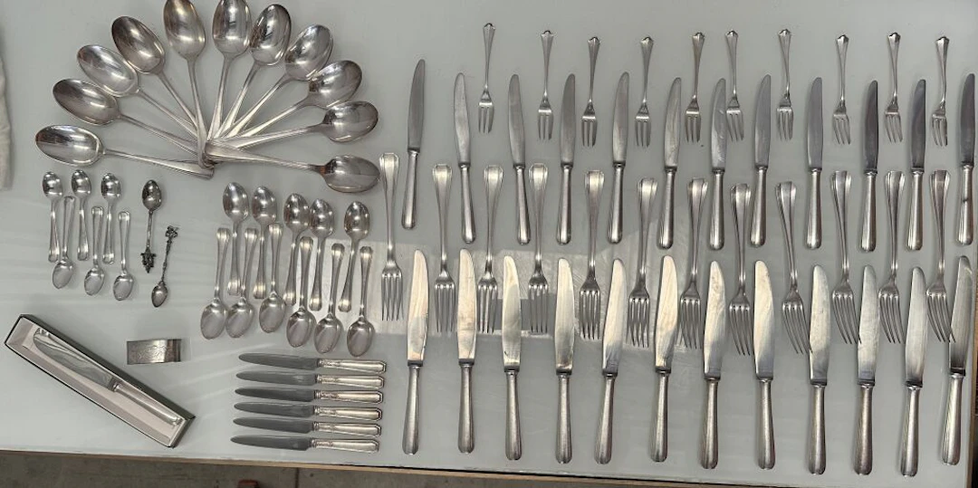 CHRISTOFLE. Art Deco-style silver plated cutlery set, including: -