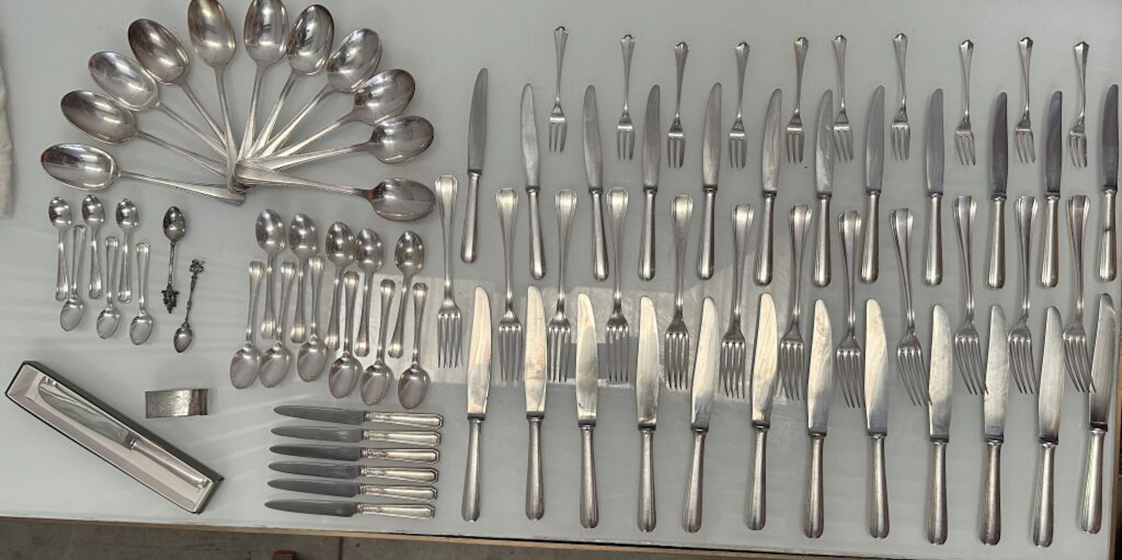 CHRISTOFLE. Art Deco-style silver plated cutlery set, including: -
