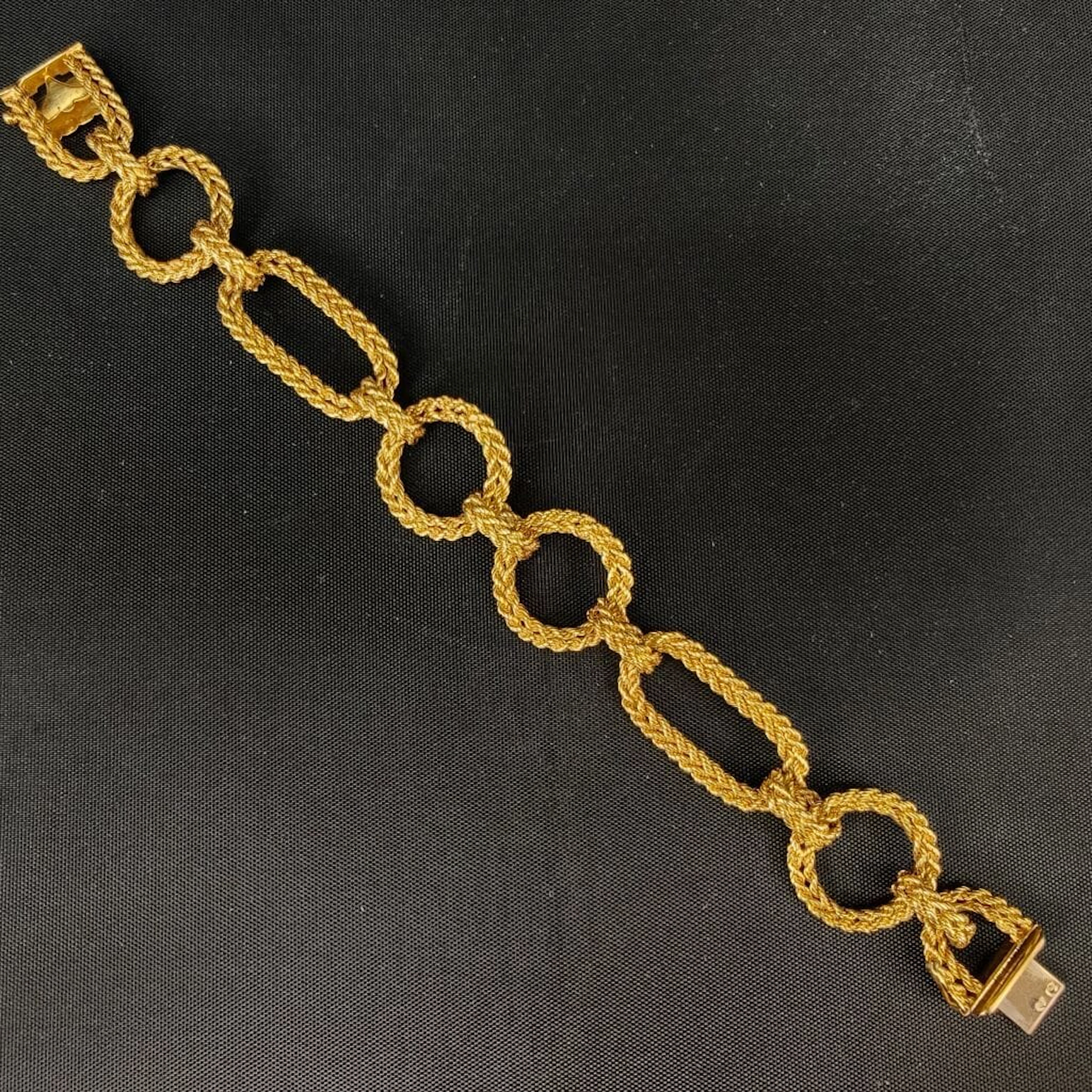 750‰ gold bracelet with a marine-style link design featuring a rope