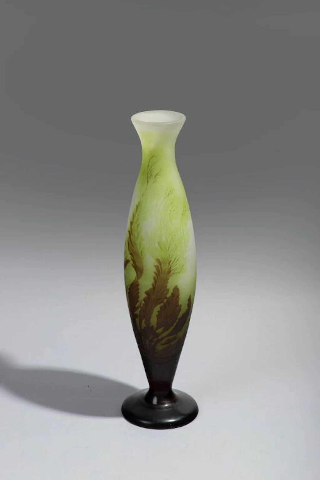 GALLÉ FACTORIES. Large oblong vase on a pedestal with a flared neck