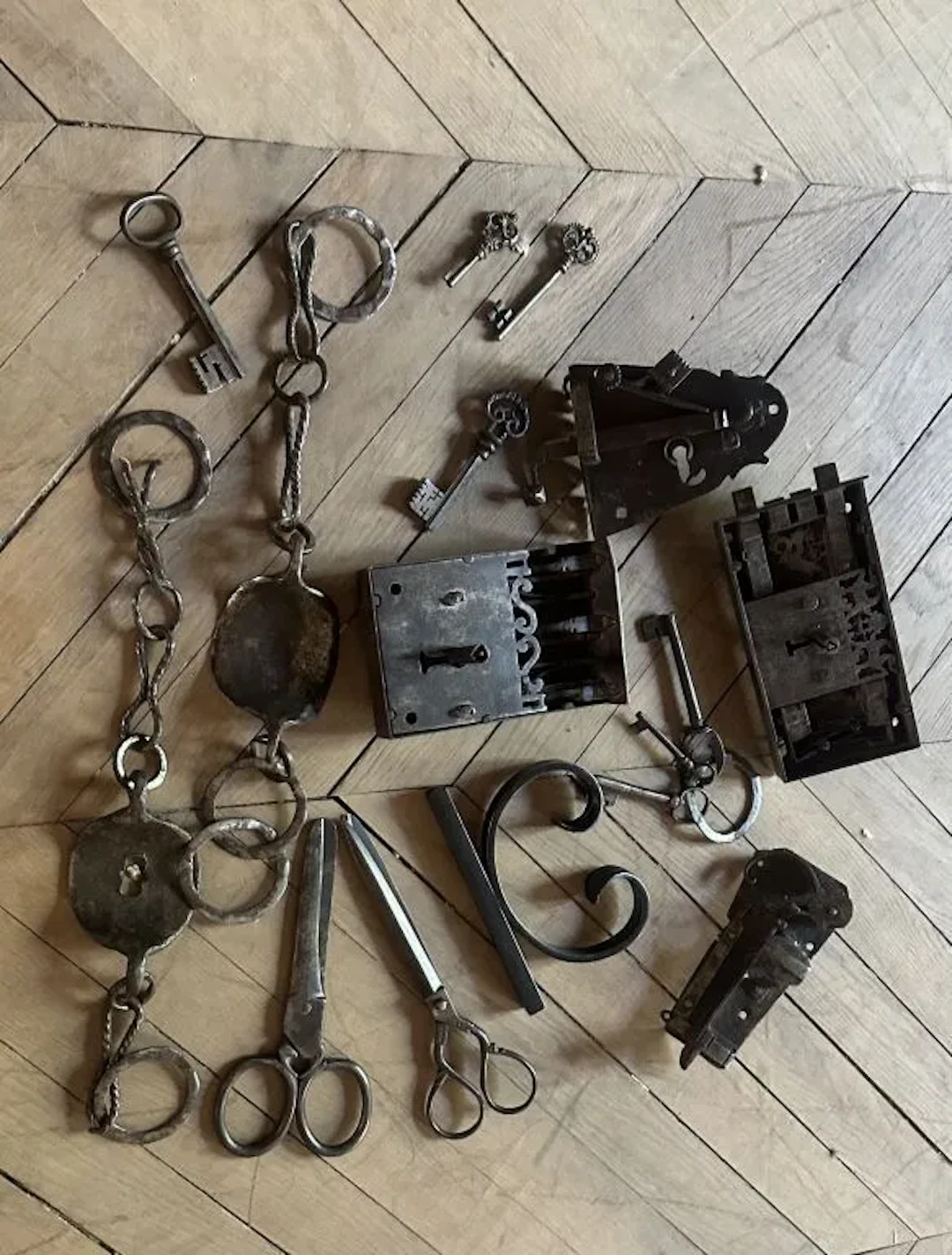 Lot of antique locks, scissors, and metal items. Lots must be picked