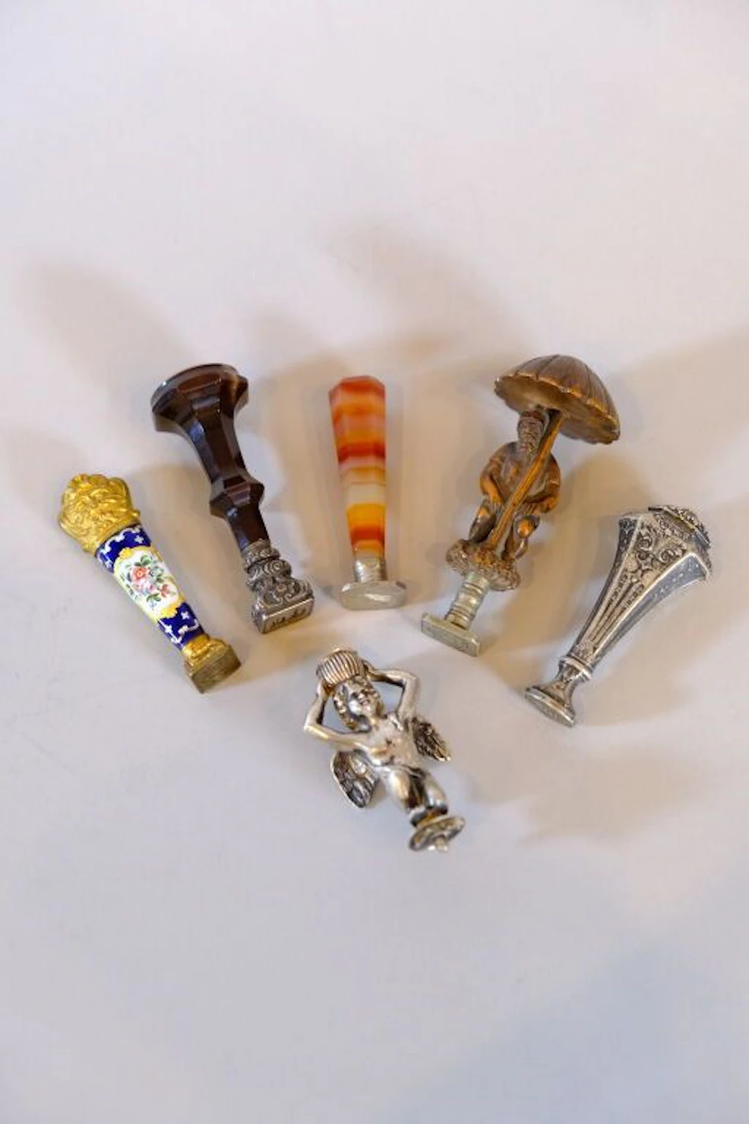 Set of 5 19th-century seals, including: - A wooden and metal seal