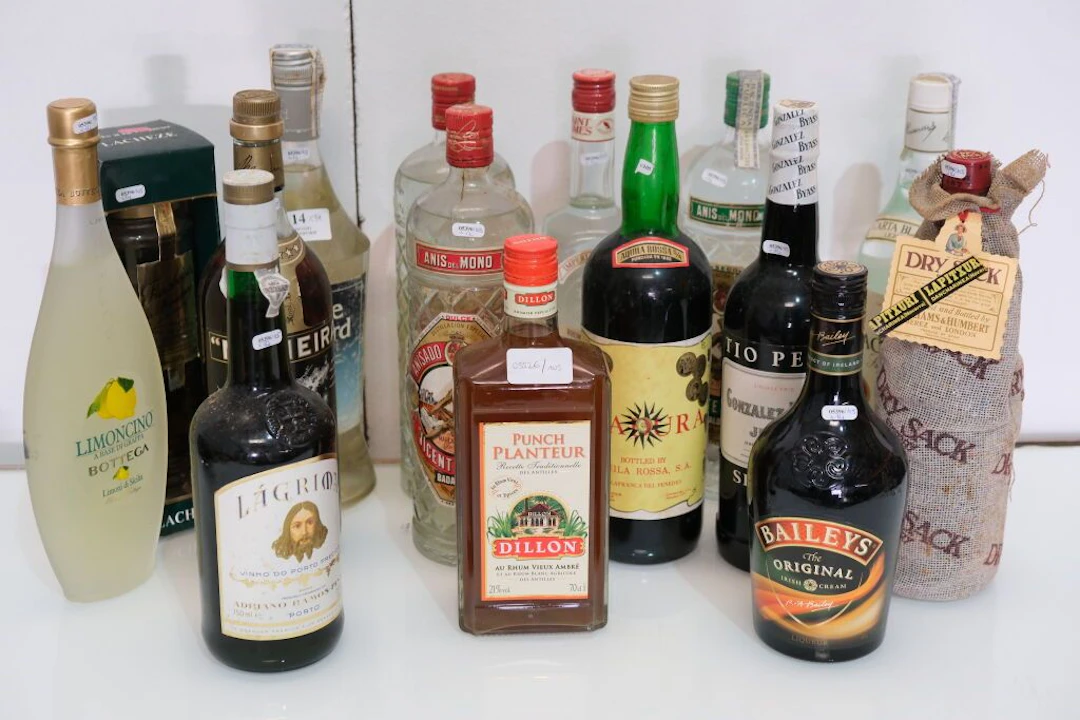 Set of spirits including: - Bottle of Dry Sack Sherry. Williams &