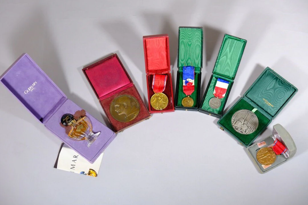 A collection of metal and bronze decorations and medals, including:
