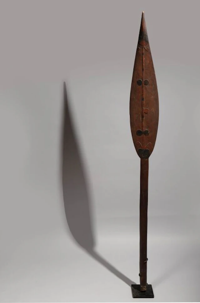 A paddle with a slightly raised figure design. Buka Islands, Solomon