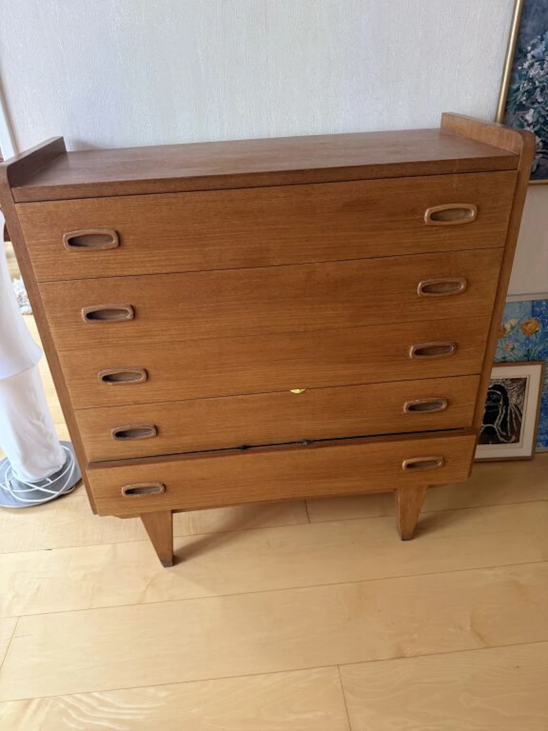 Small chest of drawers made of natural wood and wood veneer, with