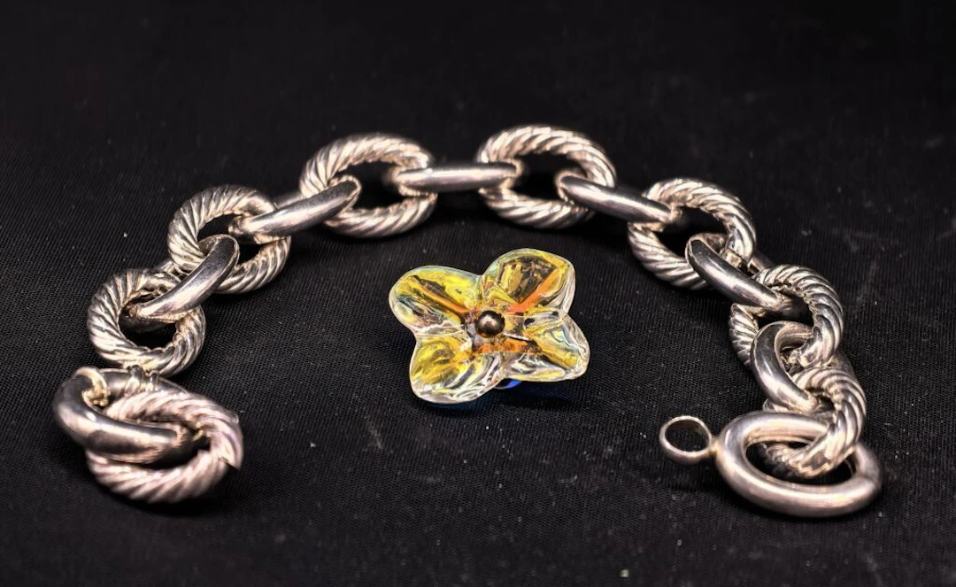 A 925‰ silver set consisting of a nautical-style chain bracelet and