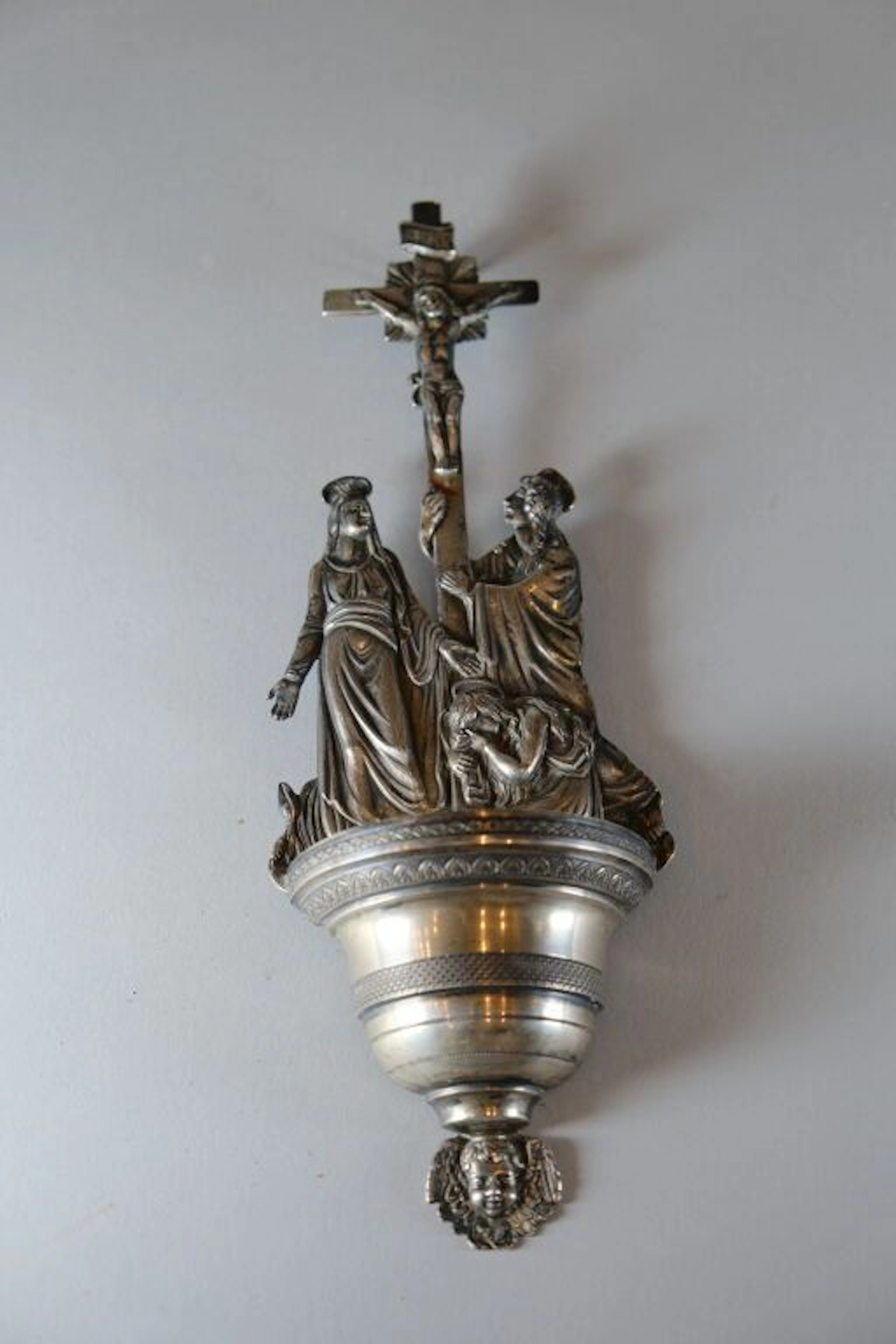 800/1000 silver holy water font topped with a crucifixion scene flanked