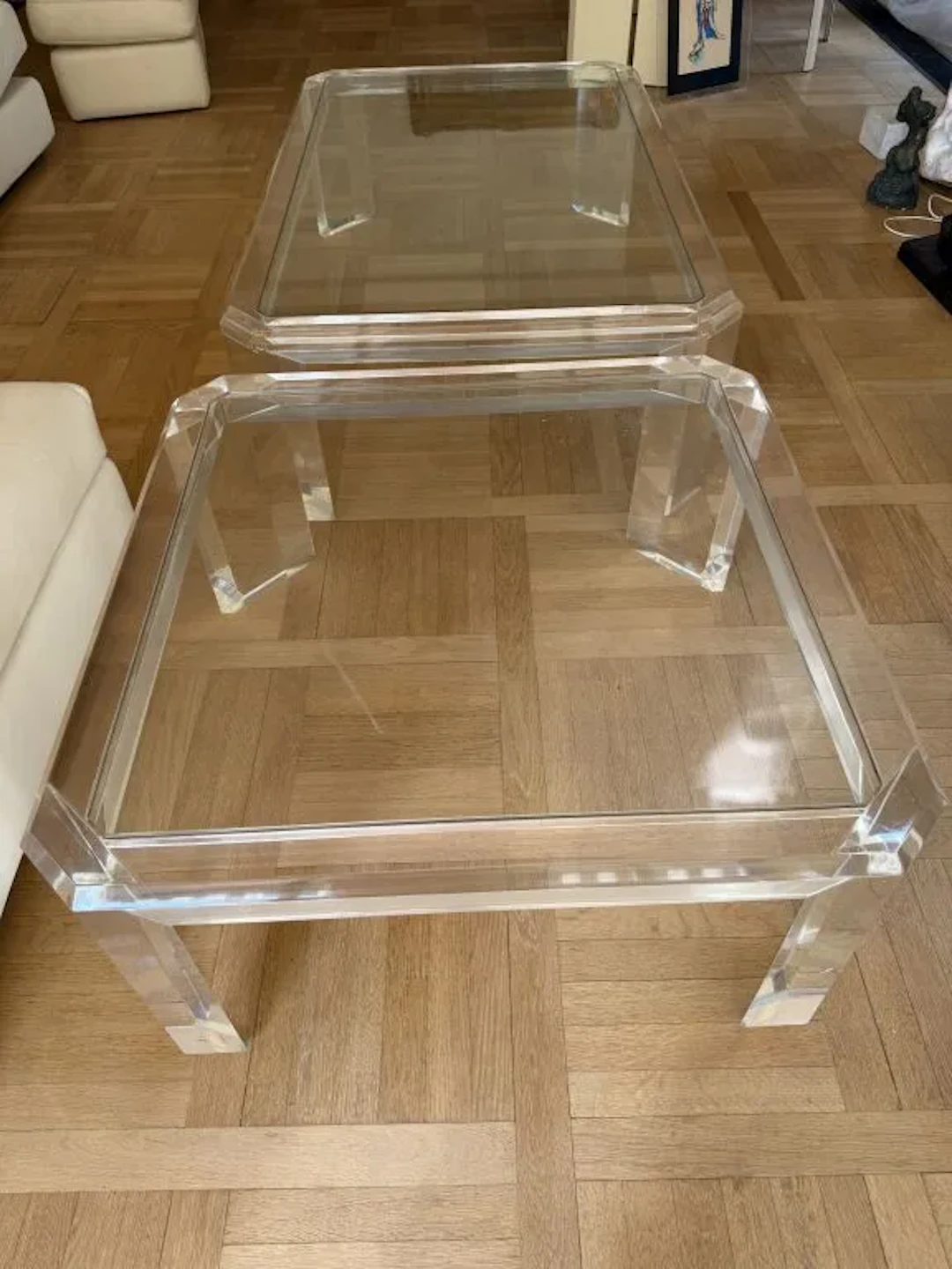 Two coffee tables with beveled edges, Plexiglas base, and a matching