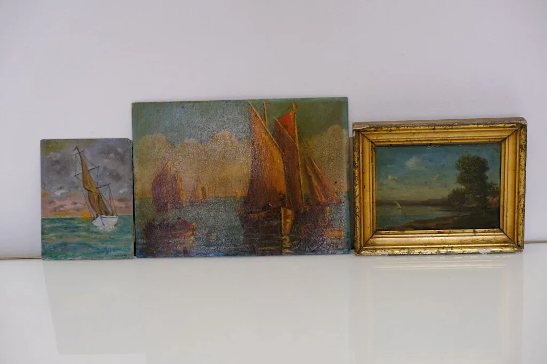 Early 20th-century French school. Sailing boat in a seaside landscape.