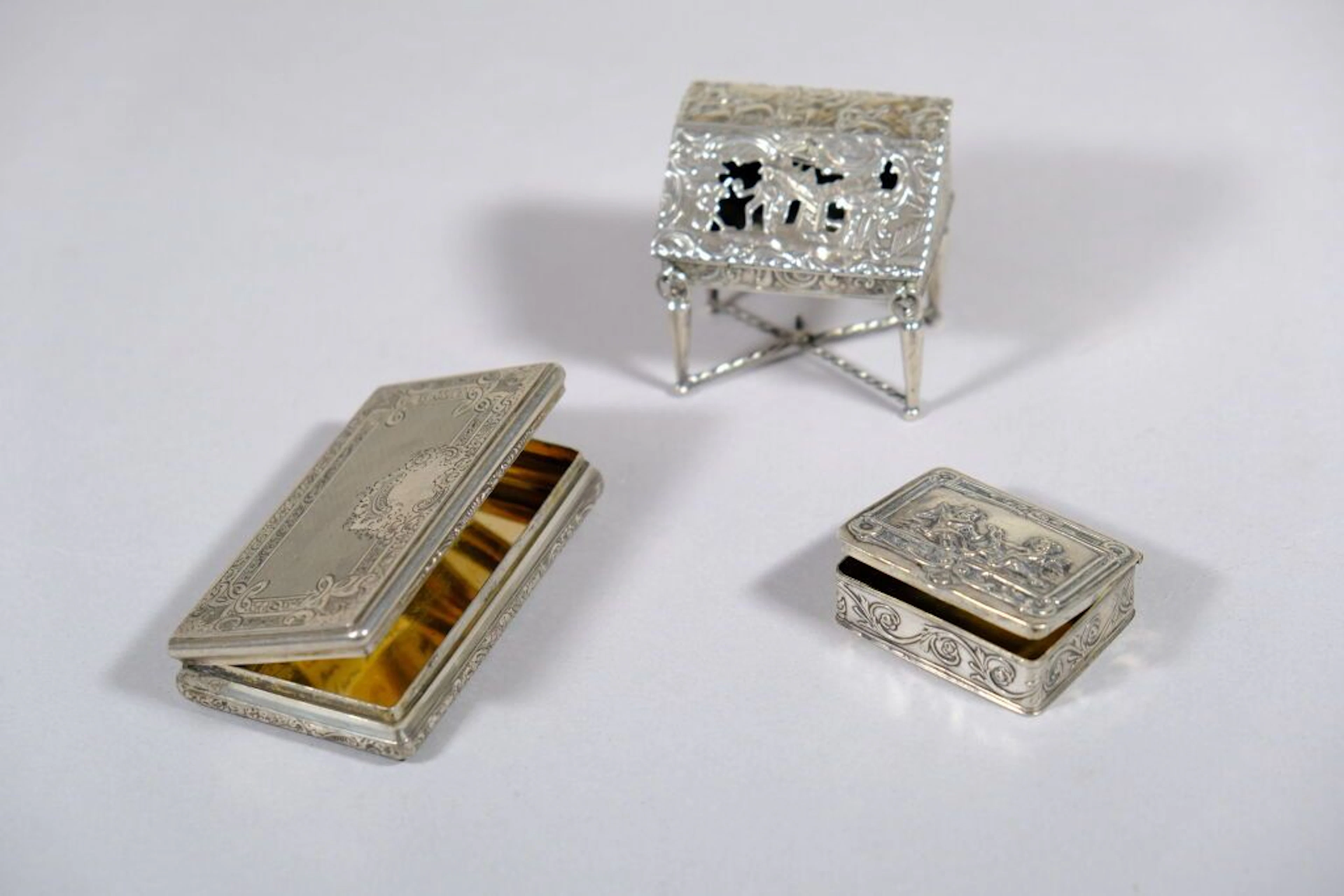 Small silver set consisting of: - A miniature sloping secretary desk