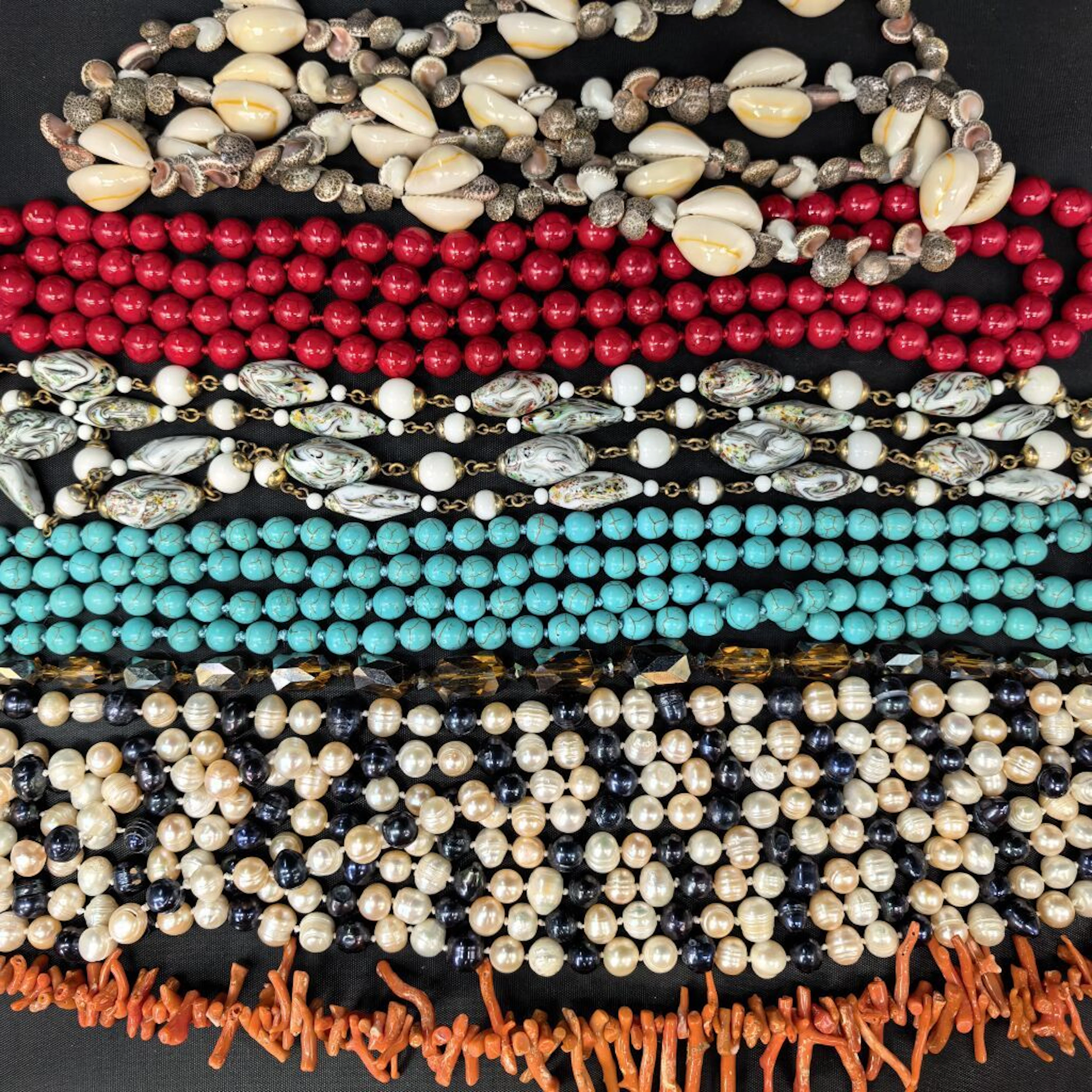 Two displays of beach jewelry and costume jewelry: - a set (or not)