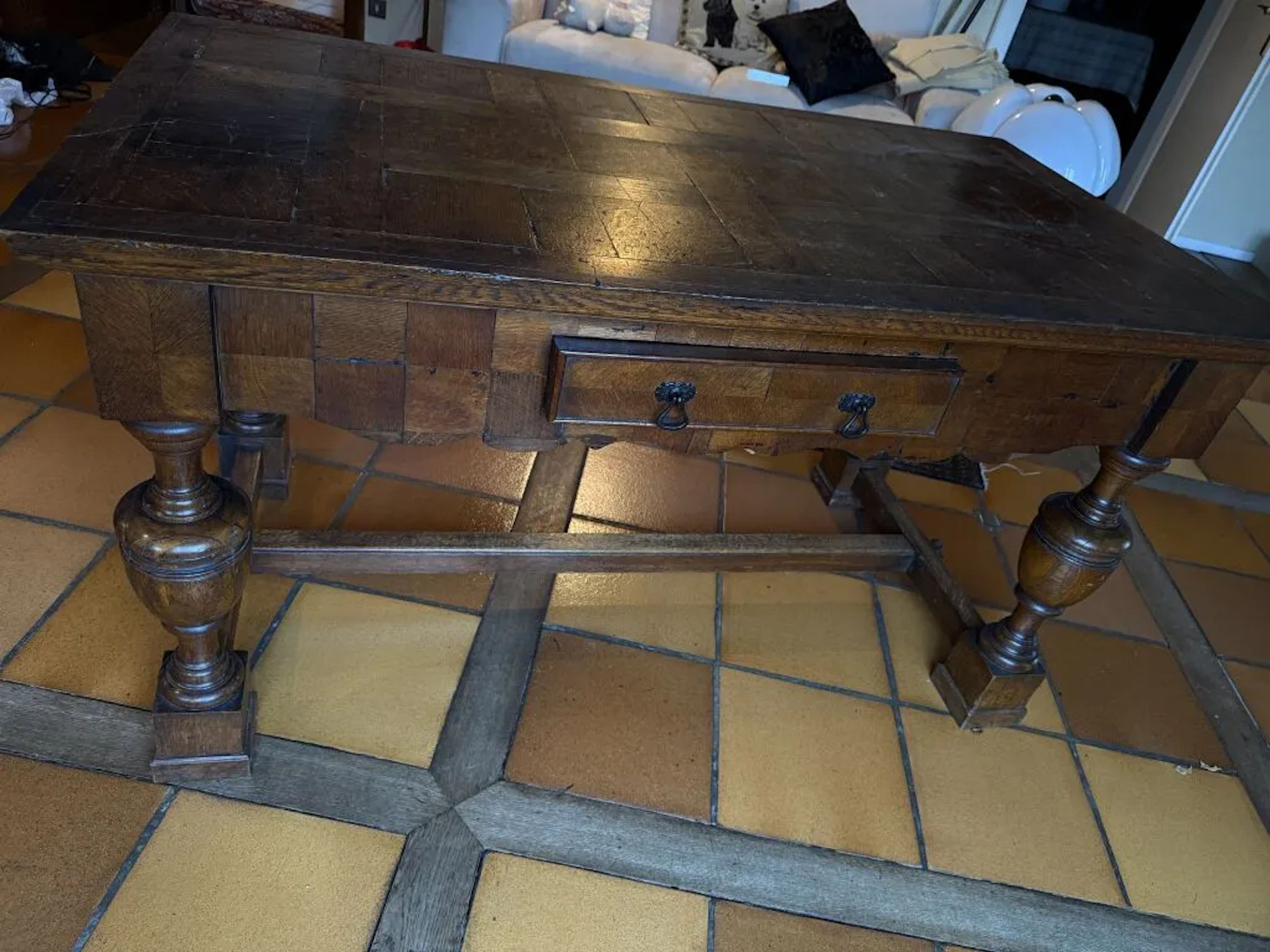 Oak desk with a drawer that opens from the side; the parquet-patterned