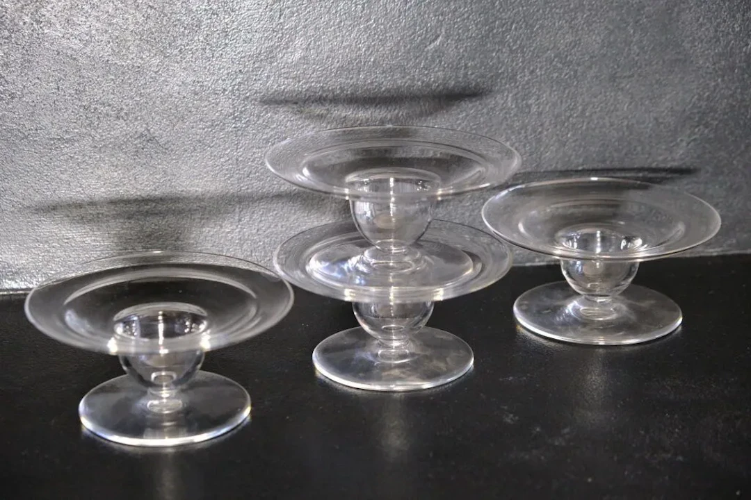 BACCARAT crystalware. Set of four “Pacques” crystal candlesticks.
