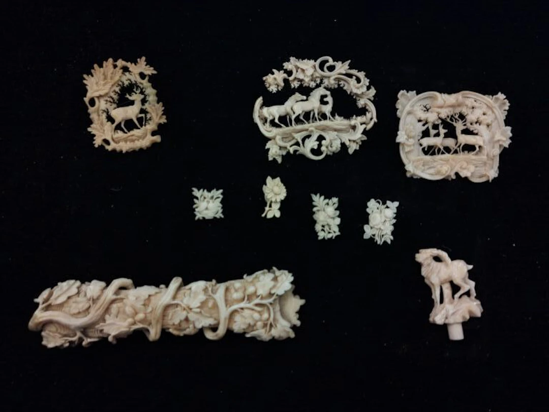 Set of carved bone pieces. Probably German, late 19th century. Includes: