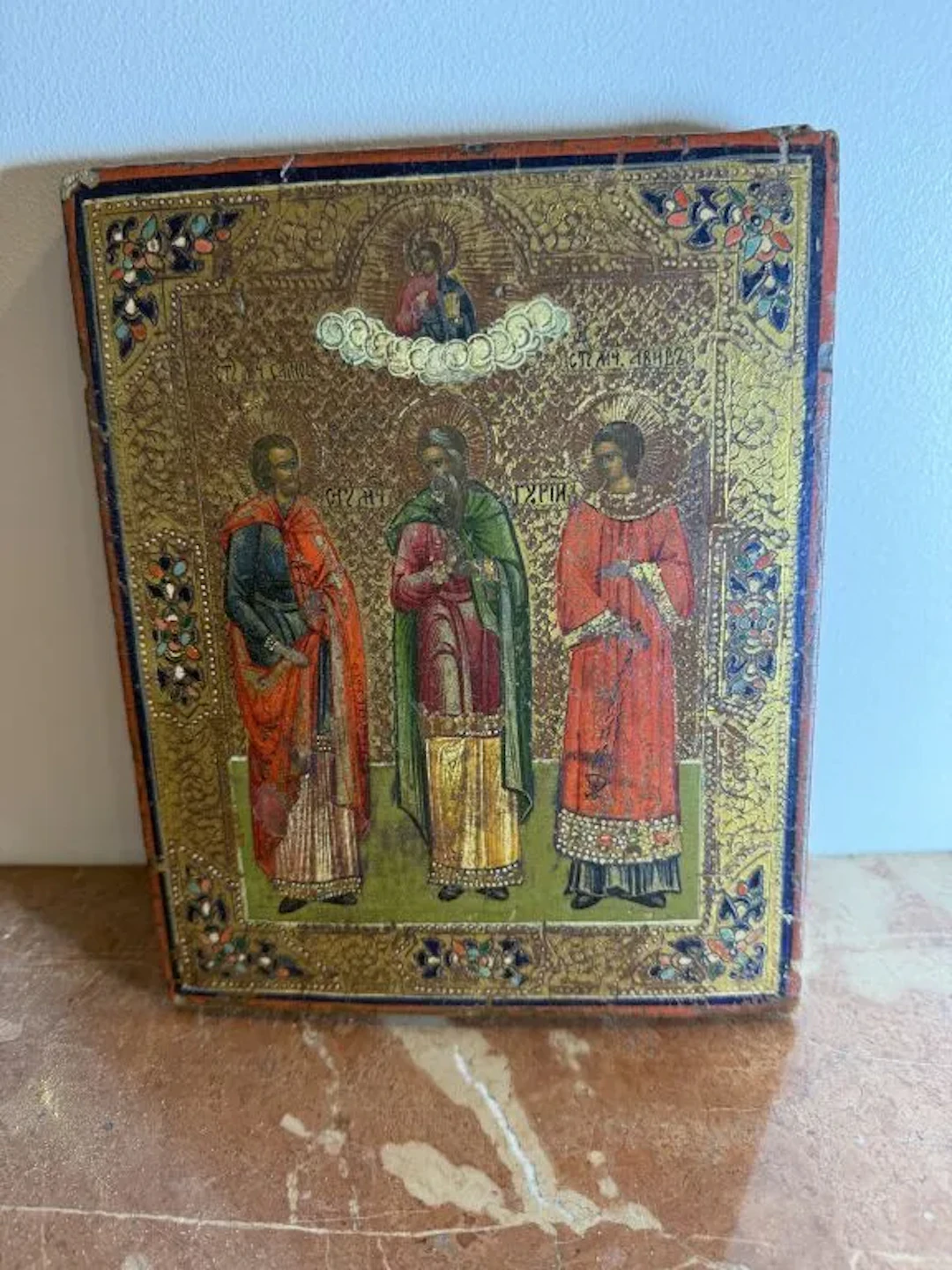 20th-century Russian school. Three saints. Wooden panel. 22 x 18 cm.