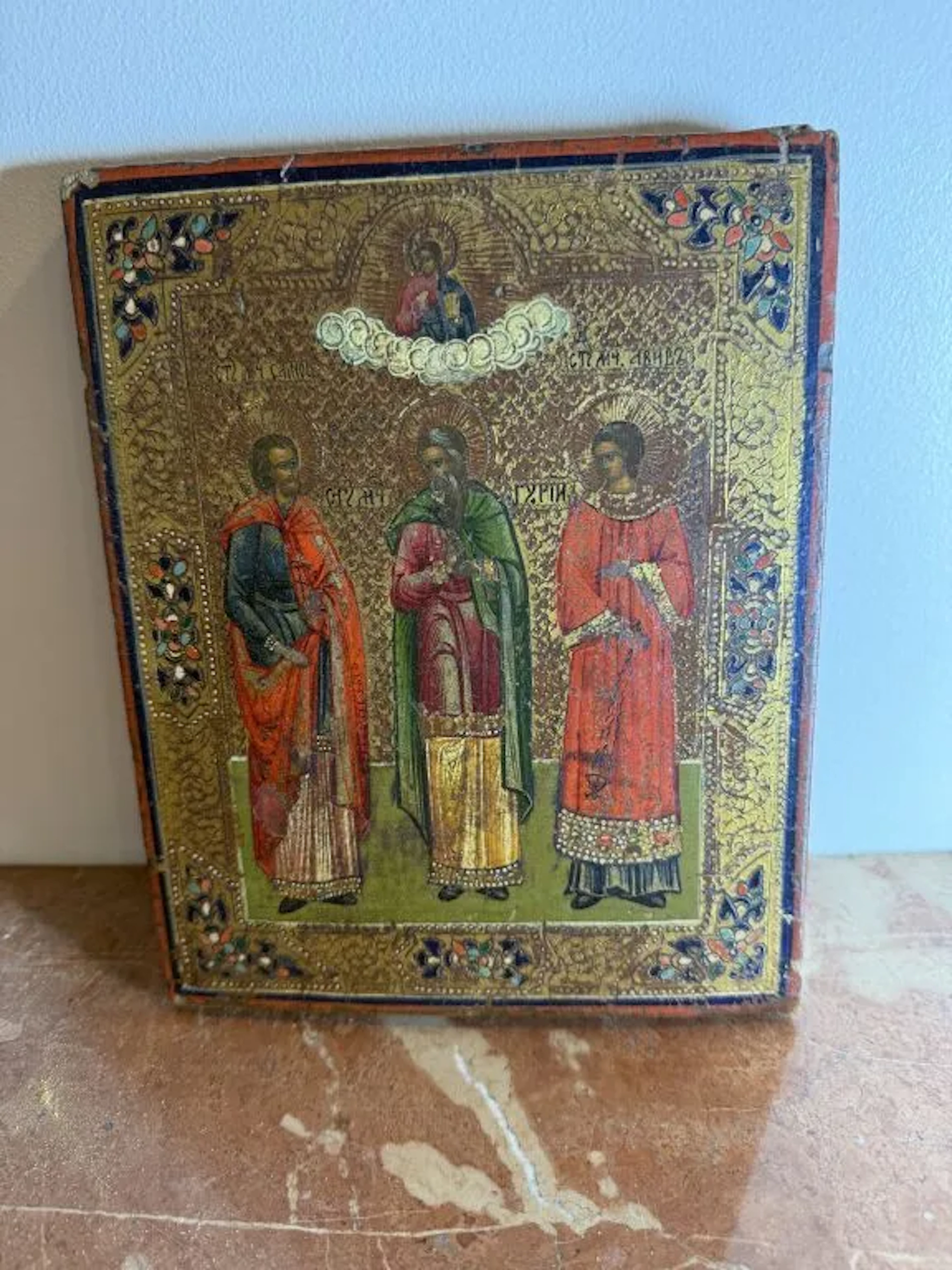20th-century Russian school. Three saints. Wooden panel. 22 x 18 cm.